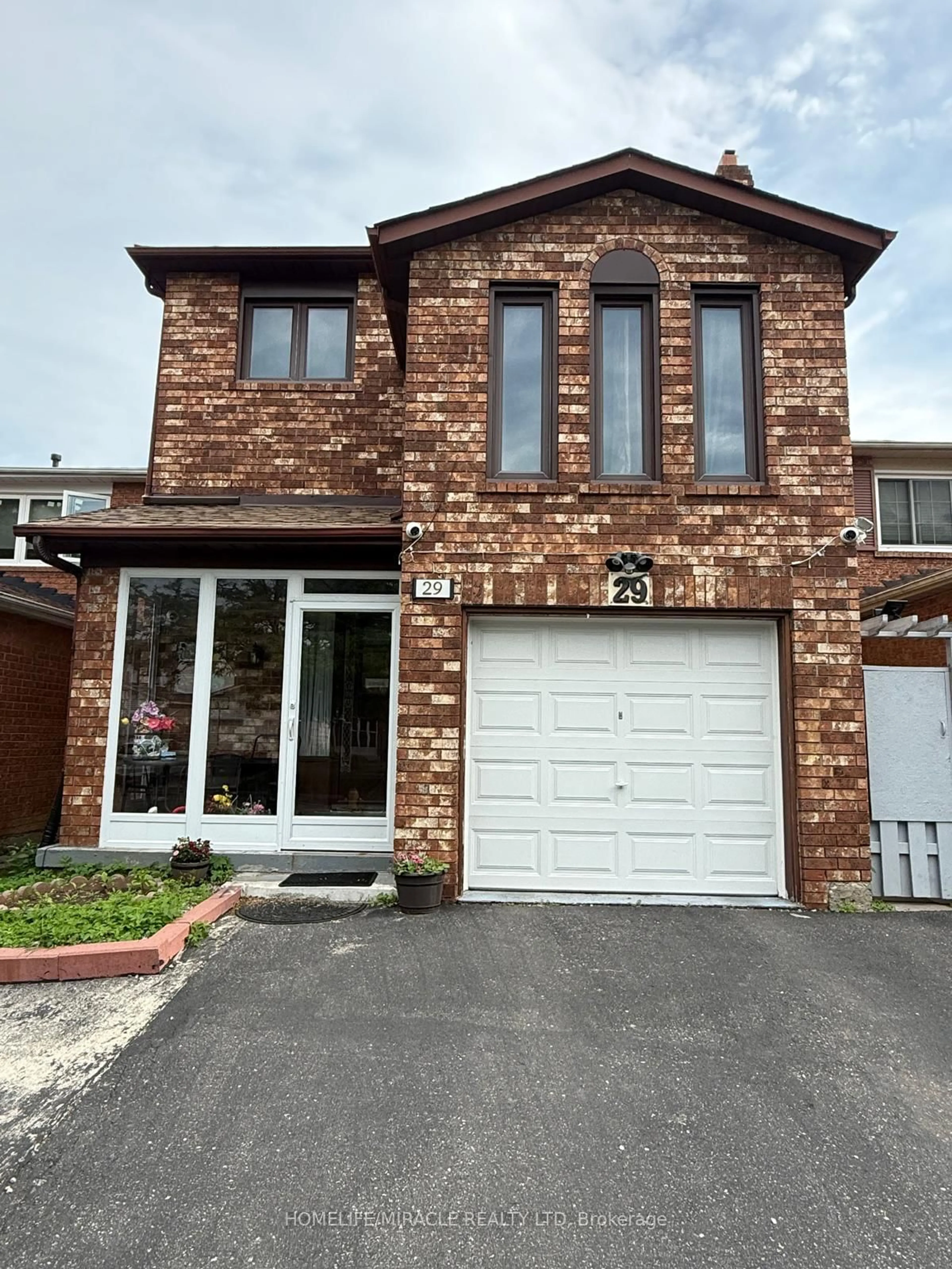 Home with brick exterior material, street for 29 Parsonage Dr, Toronto Ontario M1B 4J2