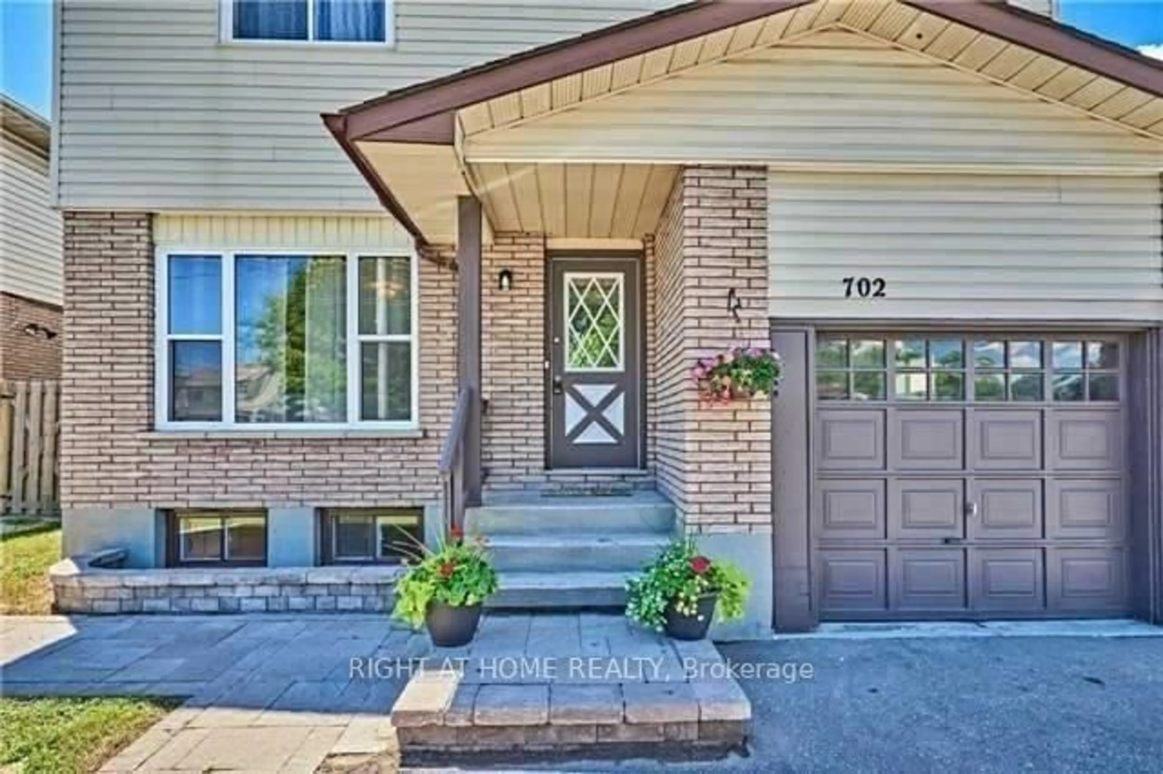 Home with brick exterior material, street for 702 Brock St, Whitby Ontario L1N 4L2