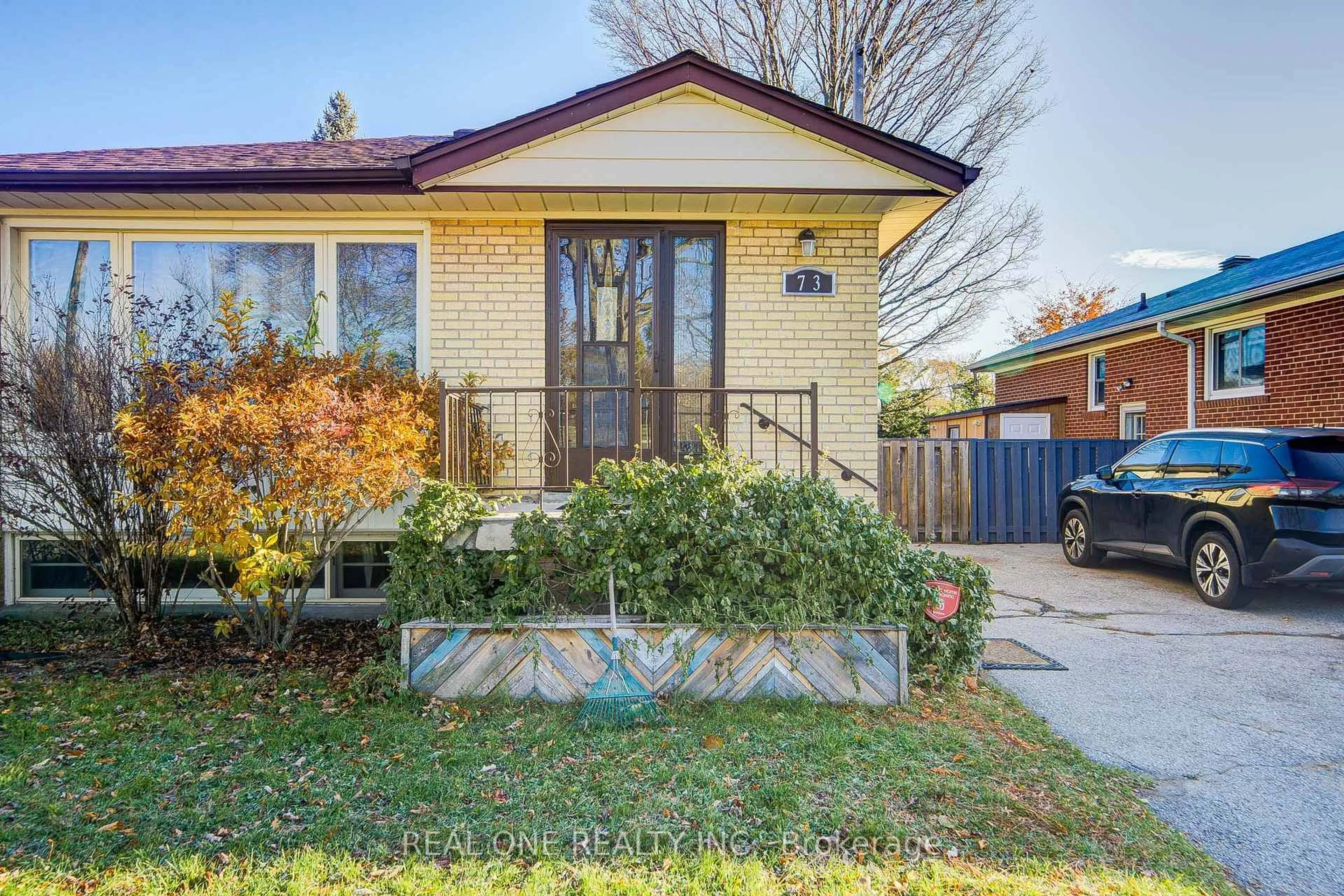 Home with brick exterior material, street for 73 Farmbrook Rd, Toronto Ontario M1J 2S6