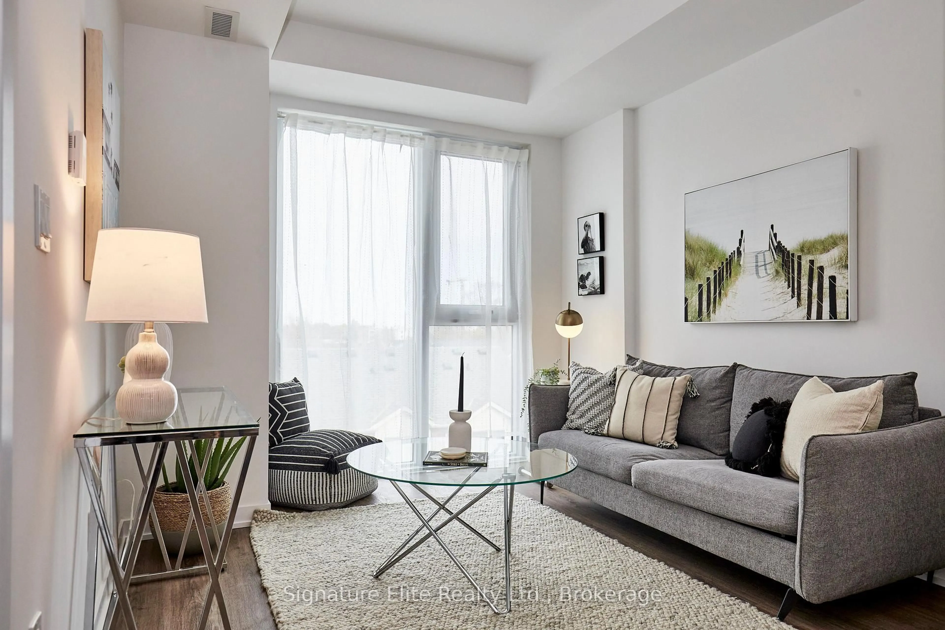 Living room with furniture, unknown for 4569 Kingston Rd #411, Toronto Ontario M1E 0C7