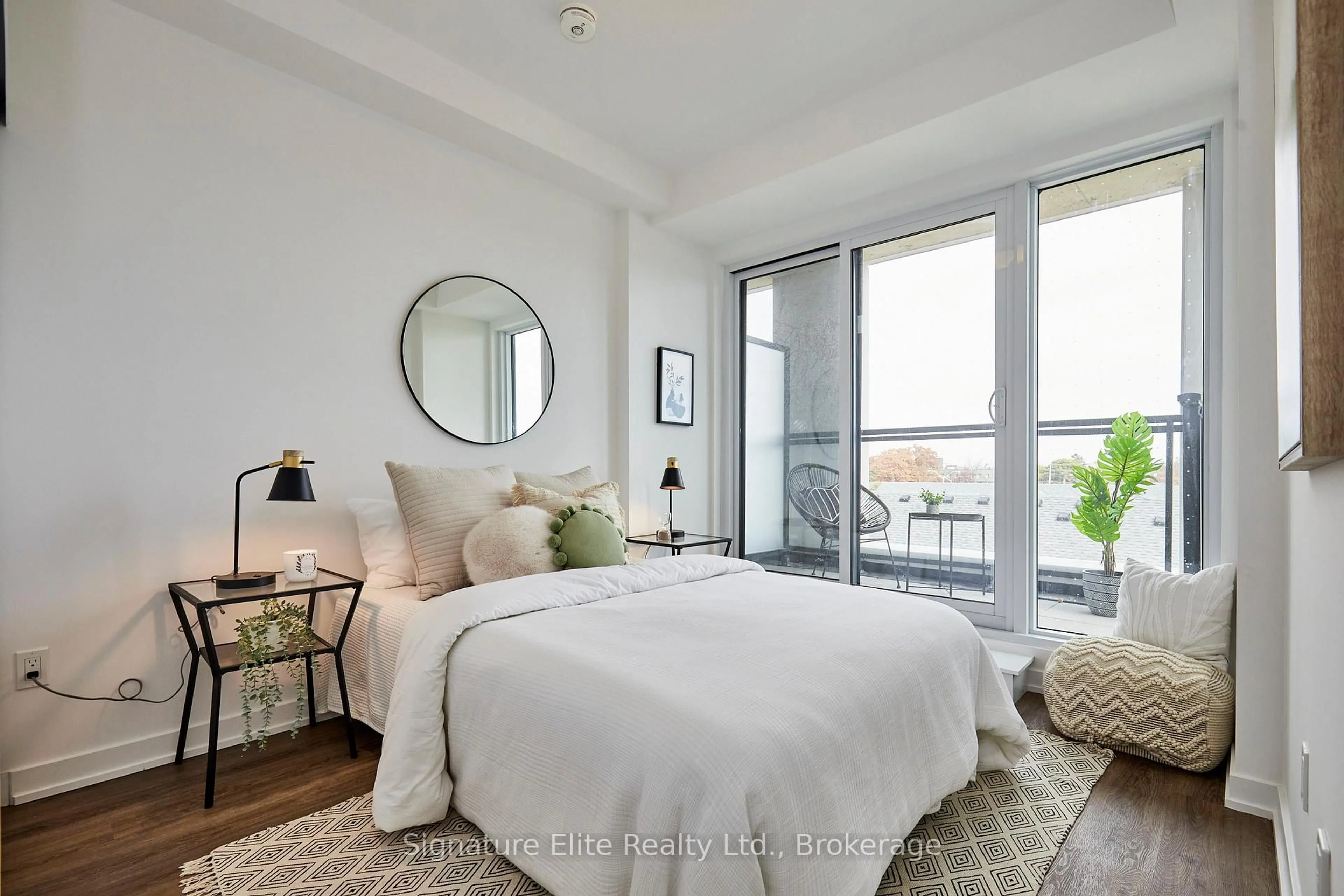 Bedroom with bed, unknown for 4569 Kingston Rd #411, Toronto Ontario M1E 0C7