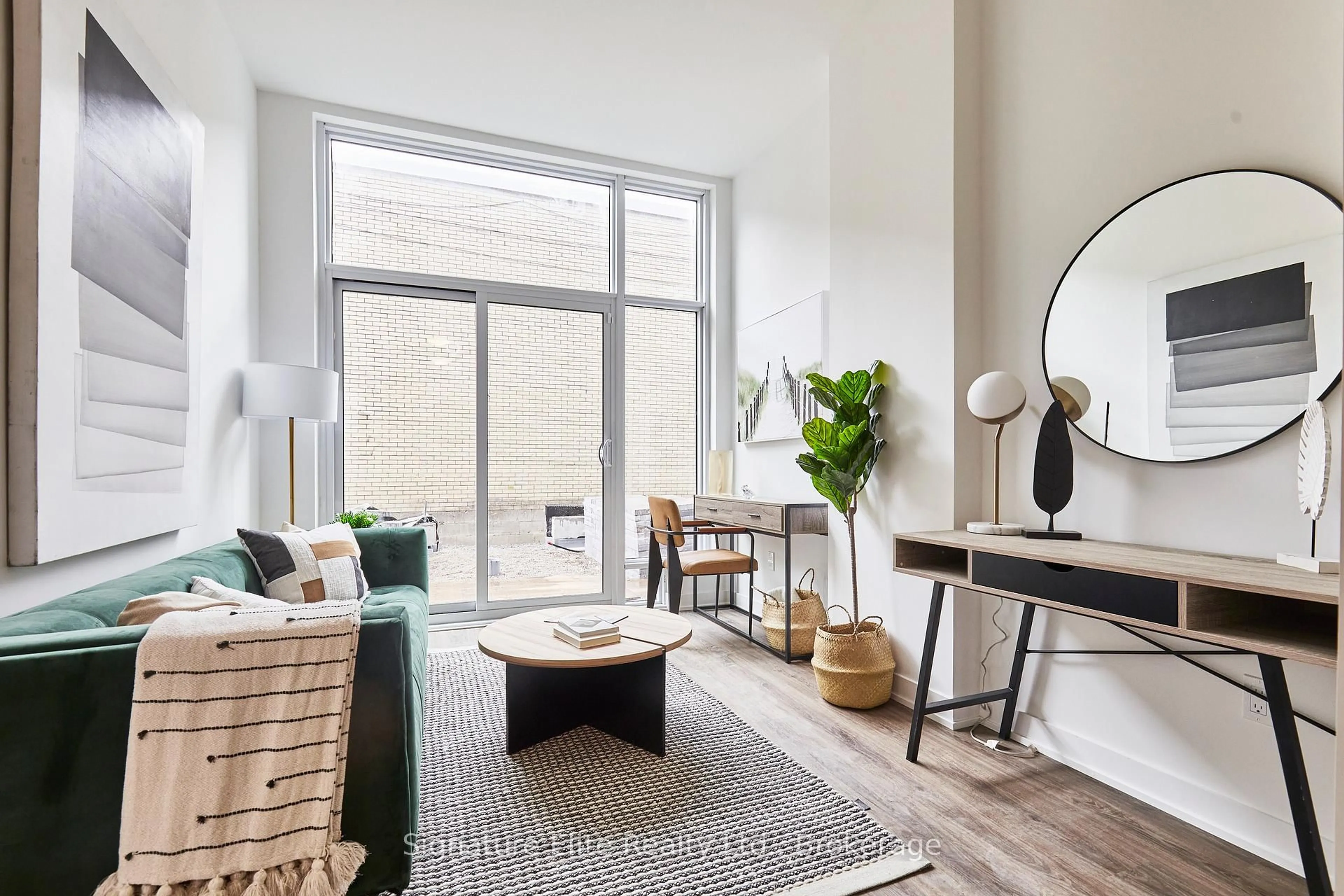 Living room with furniture, unknown for 4569 Kingston Rd #102, Toronto Ontario M1E 0C7