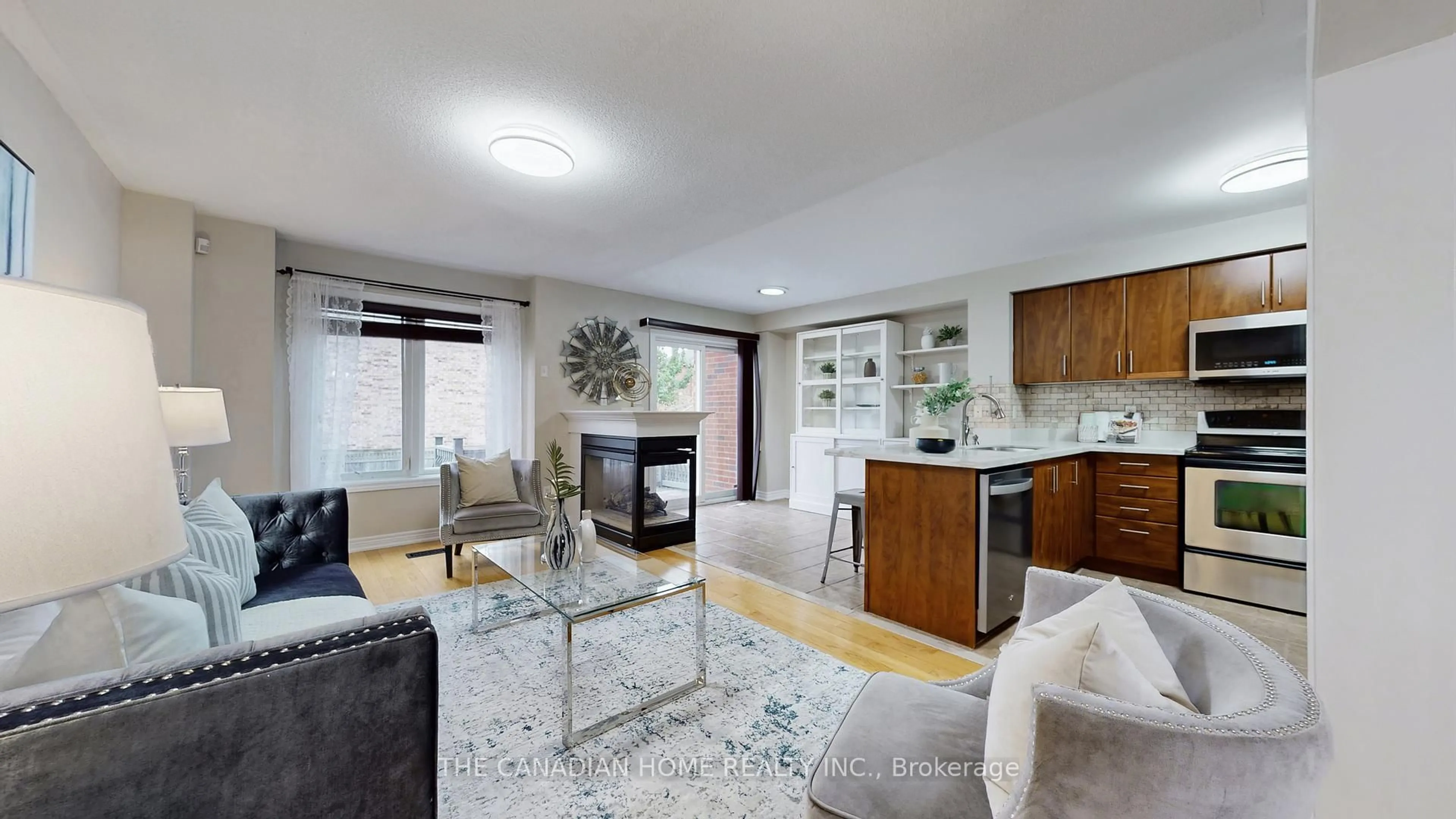 Living room with furniture, wood/laminate floor for 28 Whitefoot Cres, Ajax Ontario L1Z 2E1