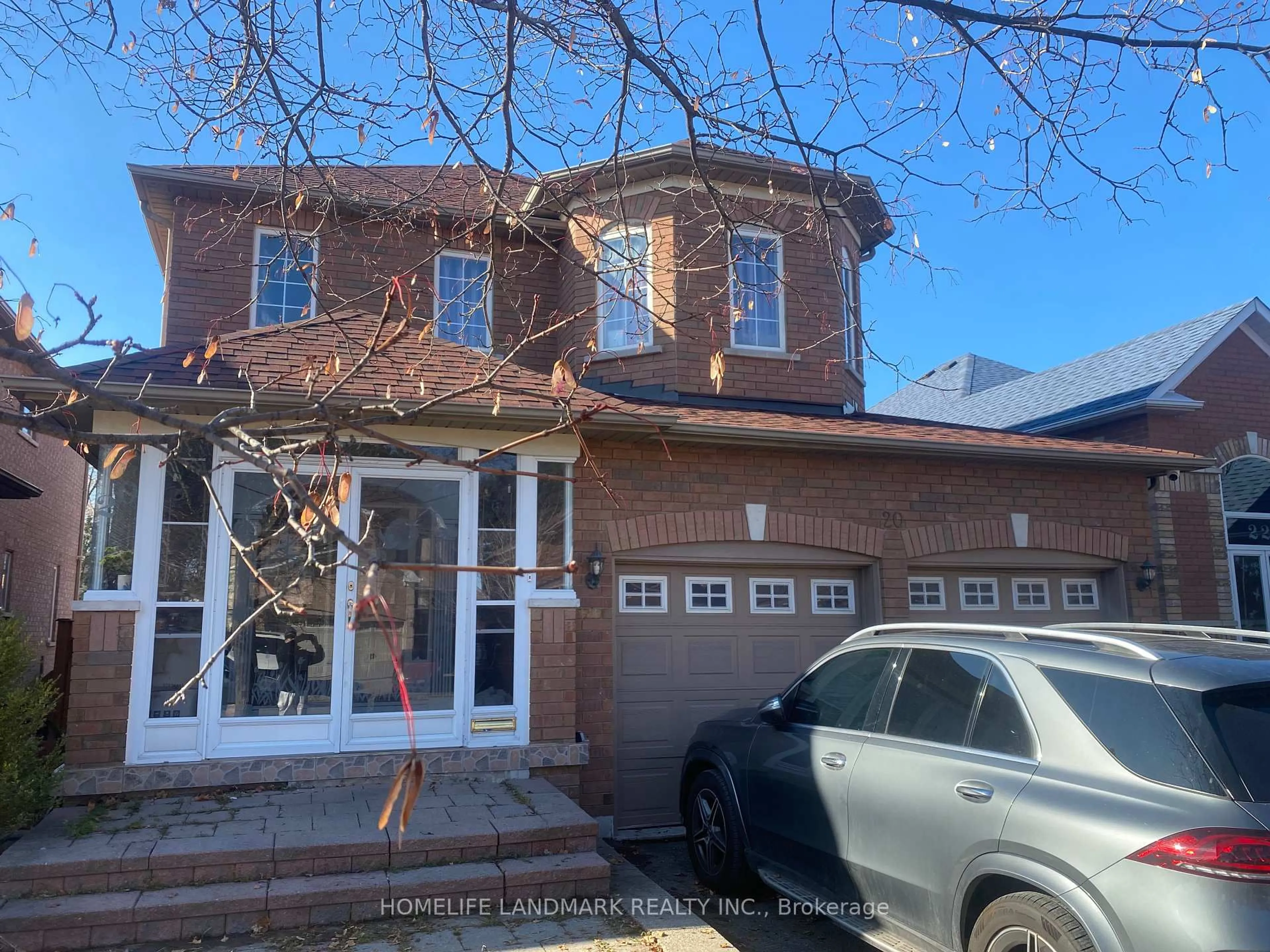 Home with brick exterior material, street for 20 Stonebridge Blvd, Toronto Ontario M1W 4A7