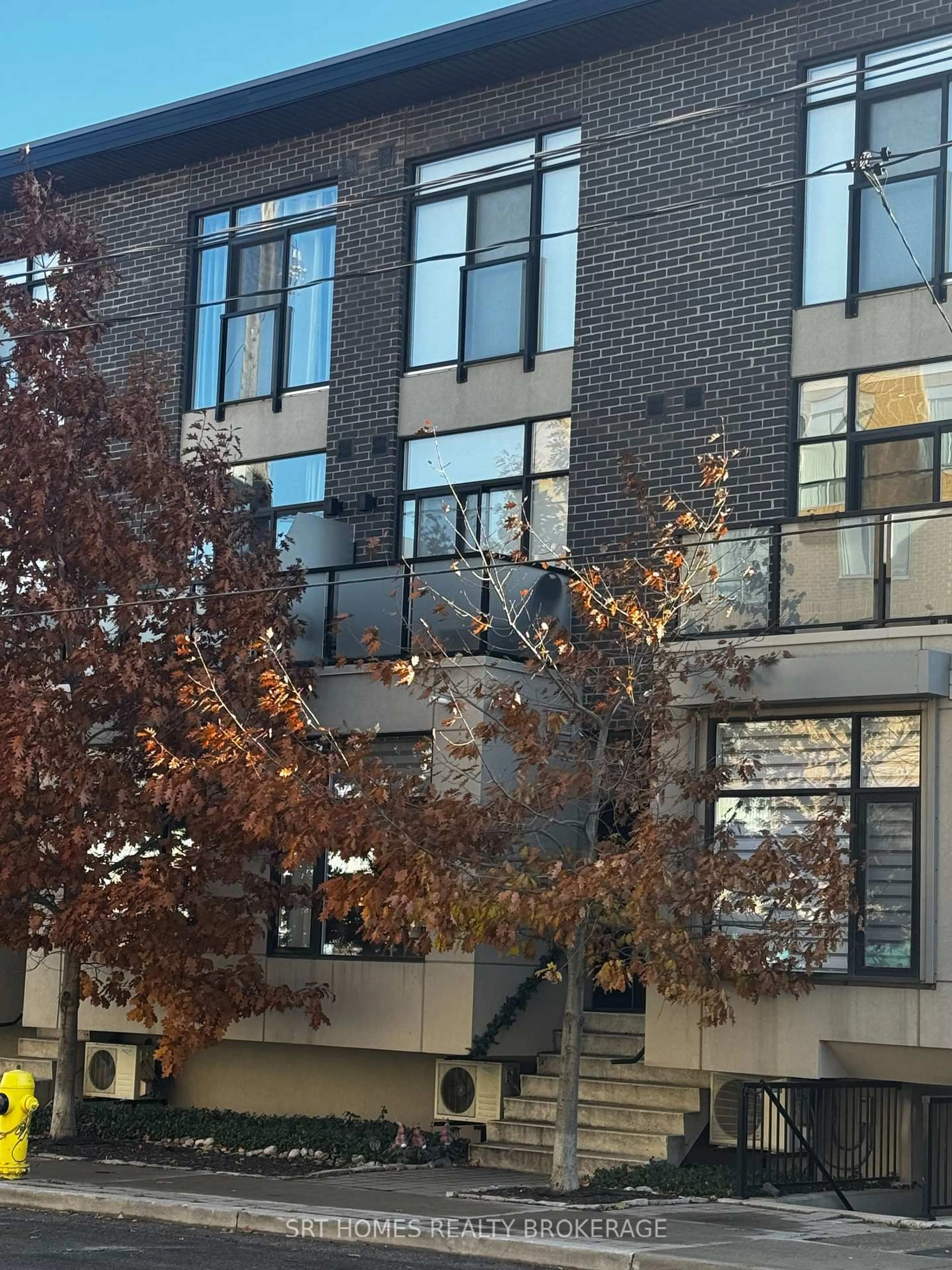 Home with brick exterior material, building for 1321 Gerrard St #9, Toronto Ontario M4L 3X1