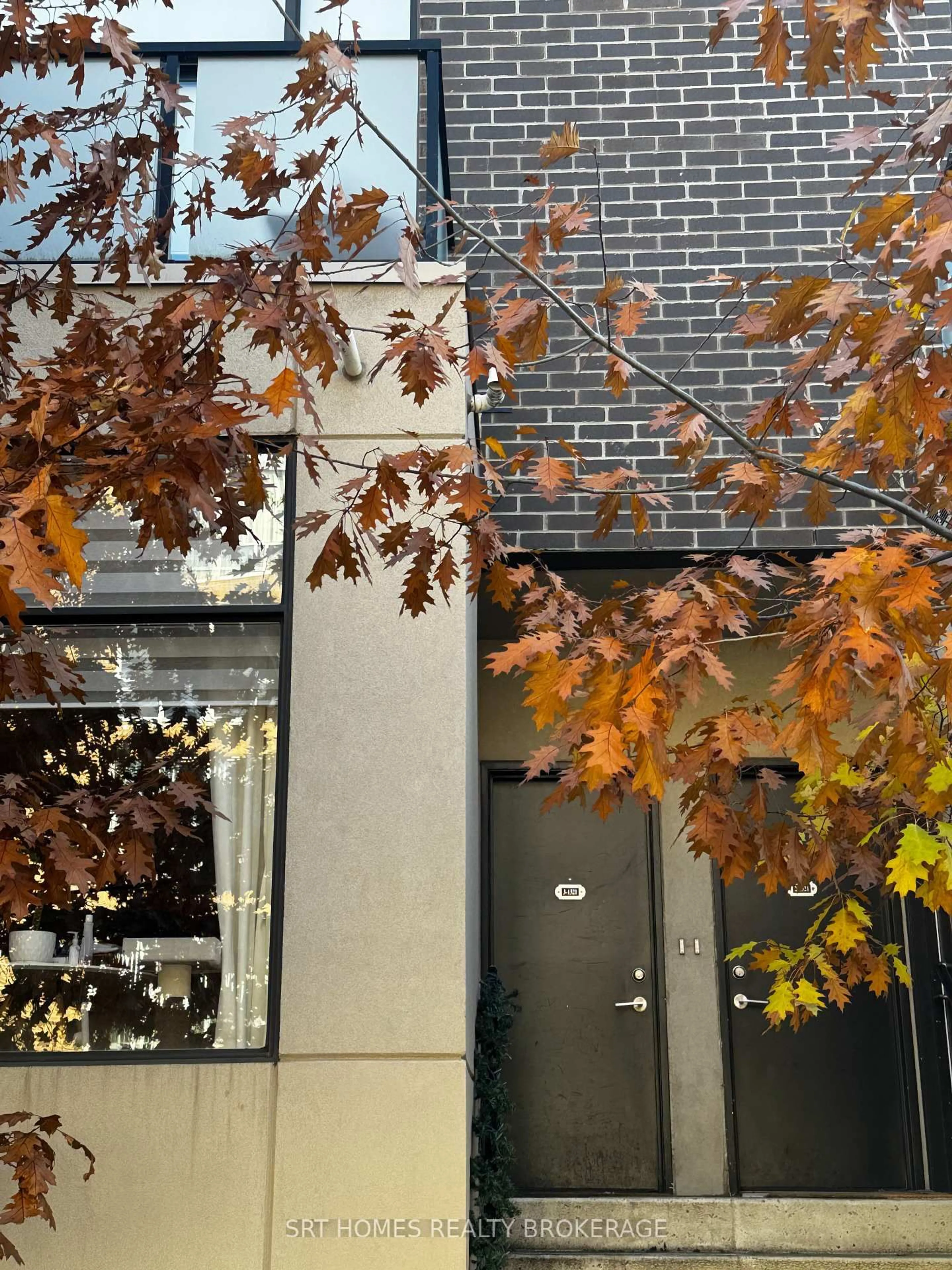 Home with brick exterior material, street for 1321 Gerrard St #9, Toronto Ontario M4L 3X1