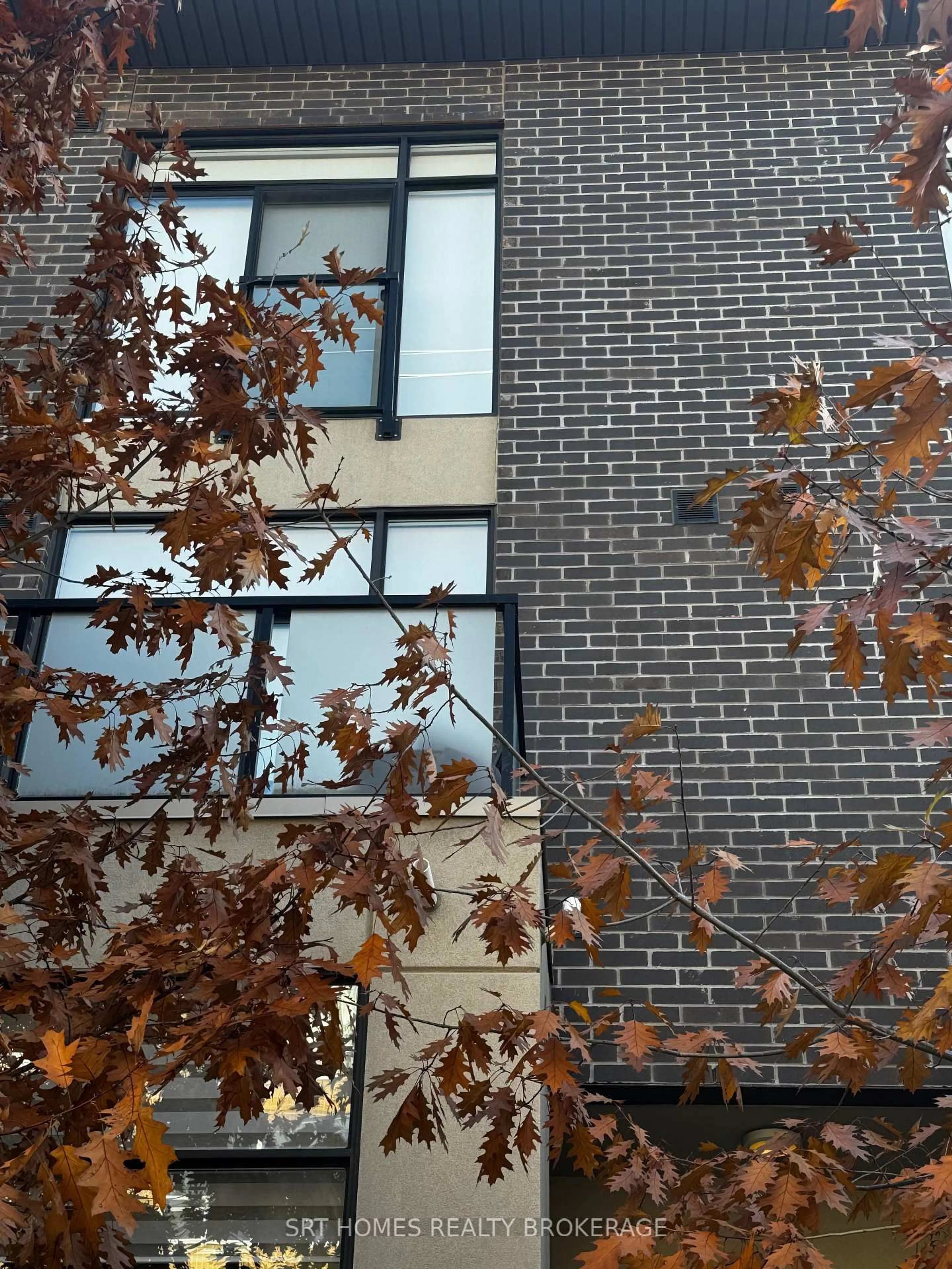 Home with brick exterior material, building for 1321 Gerrard St #9, Toronto Ontario M4L 3X1