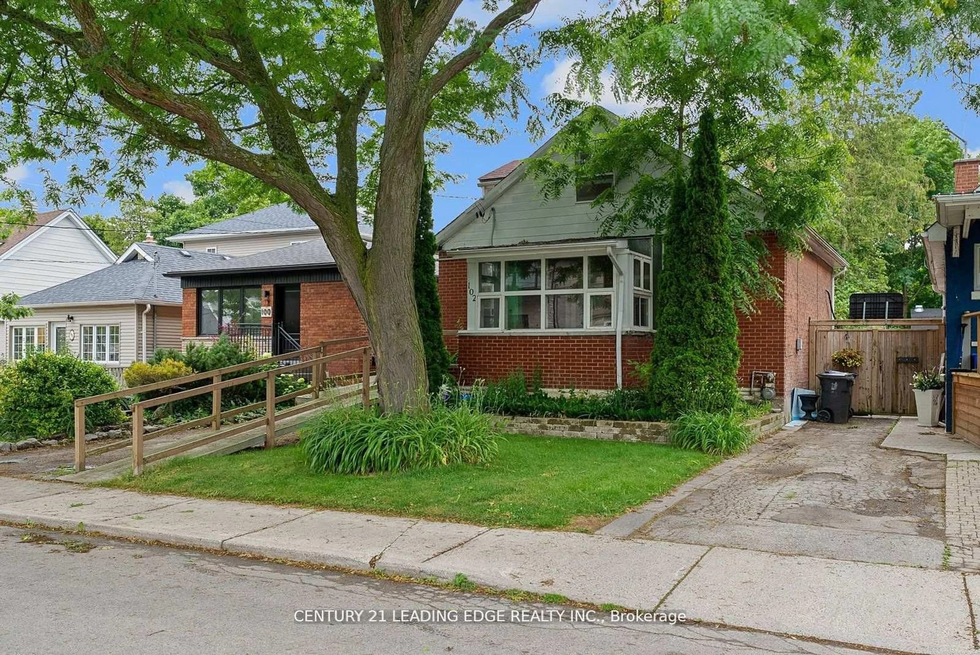 Home with brick exterior material, street for 102 Kalmar Ave, Toronto Ontario M1N 3G4
