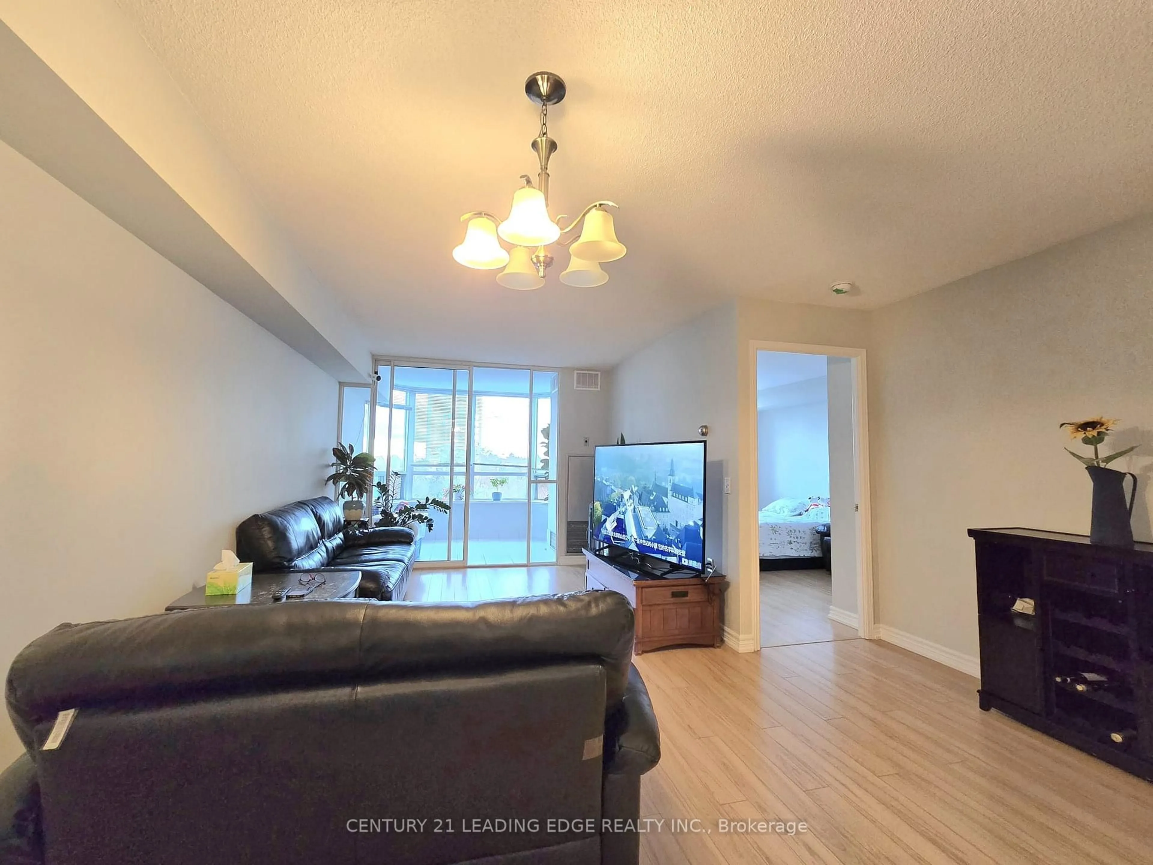 Living room with furniture, unknown for 5001 Finch Ave #610, Toronto Ontario M1S 5J9