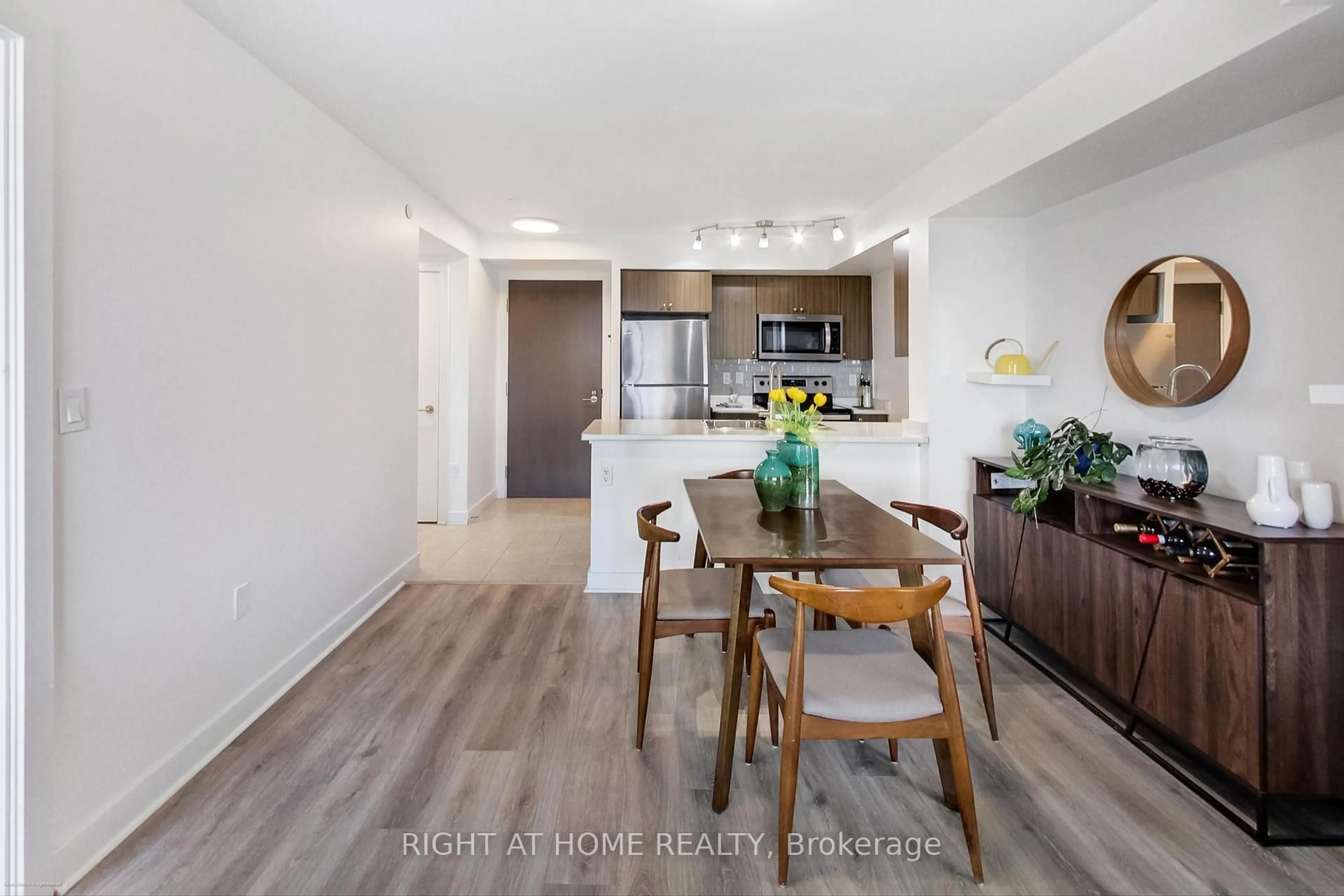 Open concept kitchen, wood/laminate floor for 1346 Danforth Rd #706, Toronto Ontario M1J 0A9