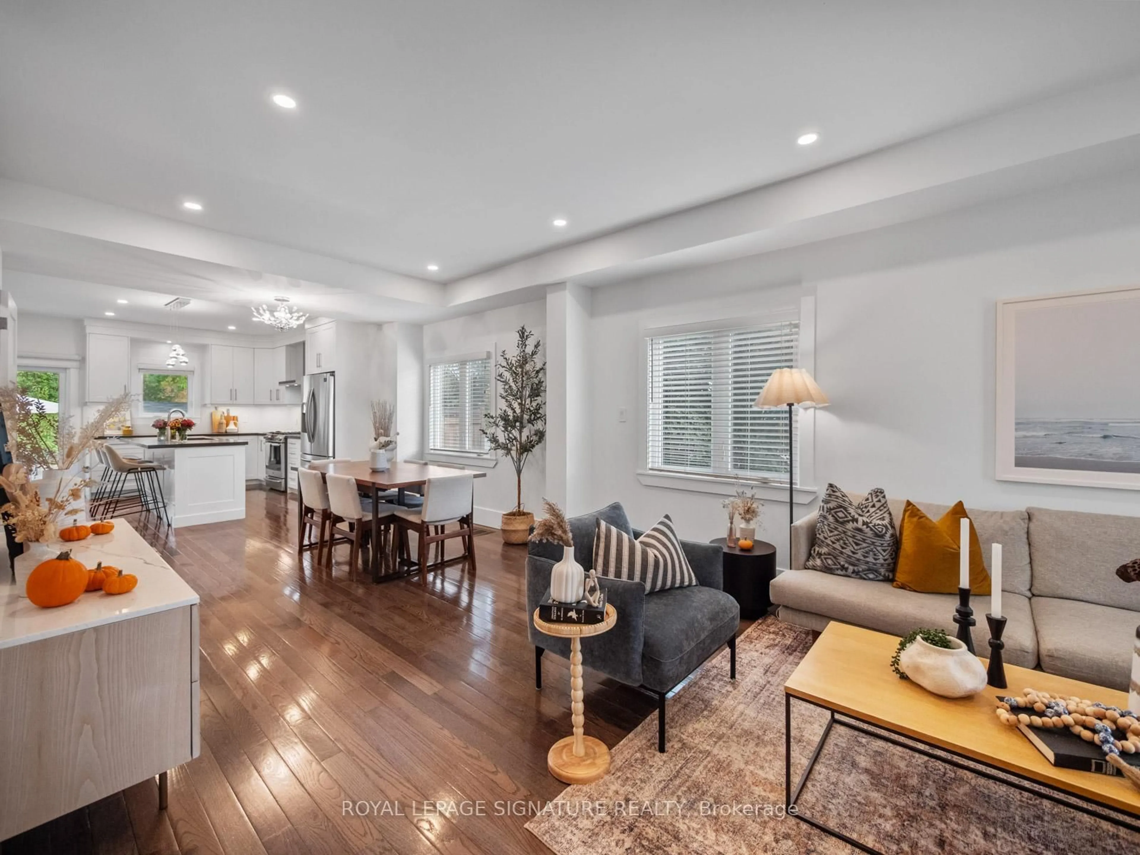 Living room with furniture, wood/laminate floor for 151 Eastwood Ave, Toronto Ontario M1N 3H5