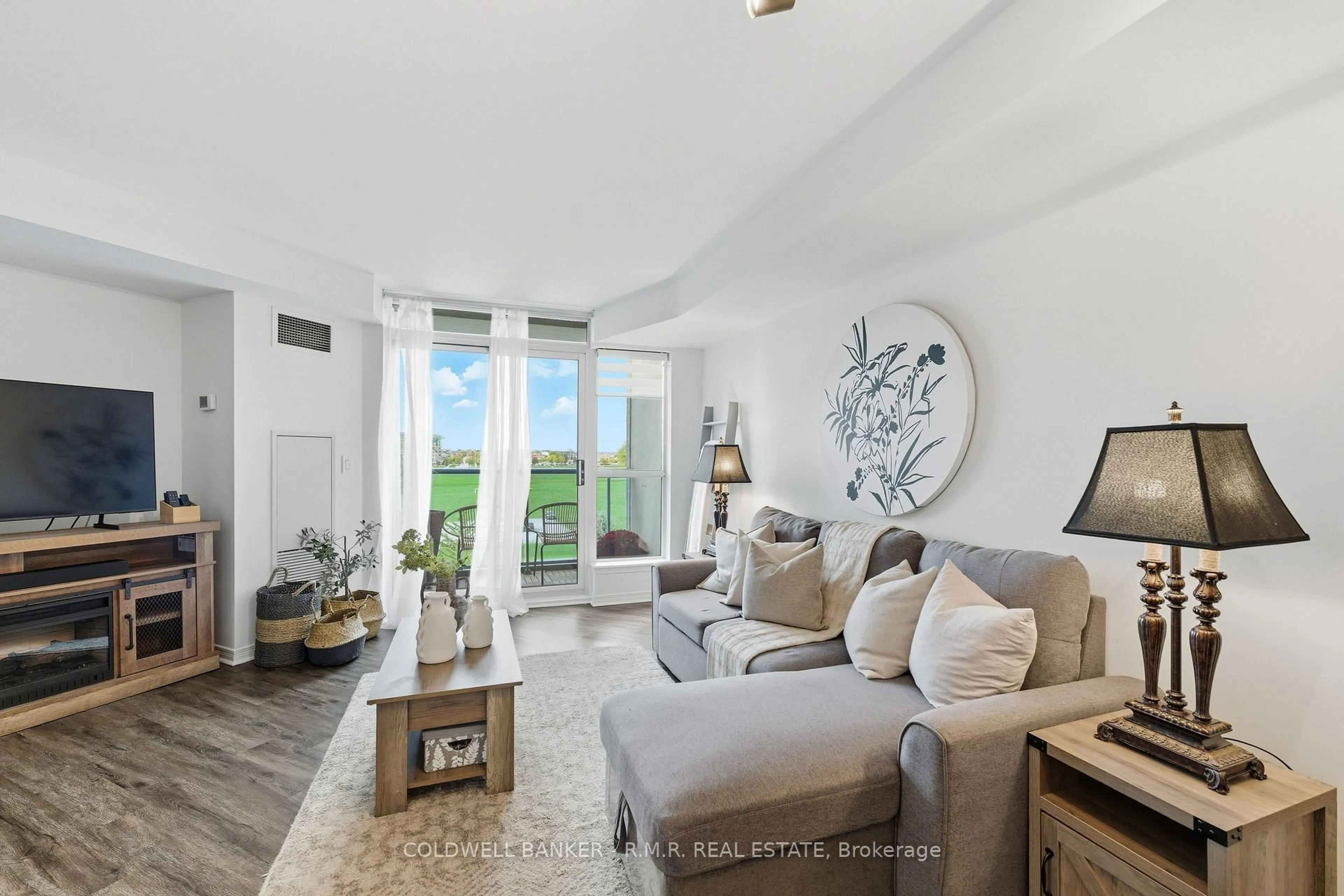 Living room with furniture, unknown for 340 Watson St #517, Whitby Ontario L1N 9G1