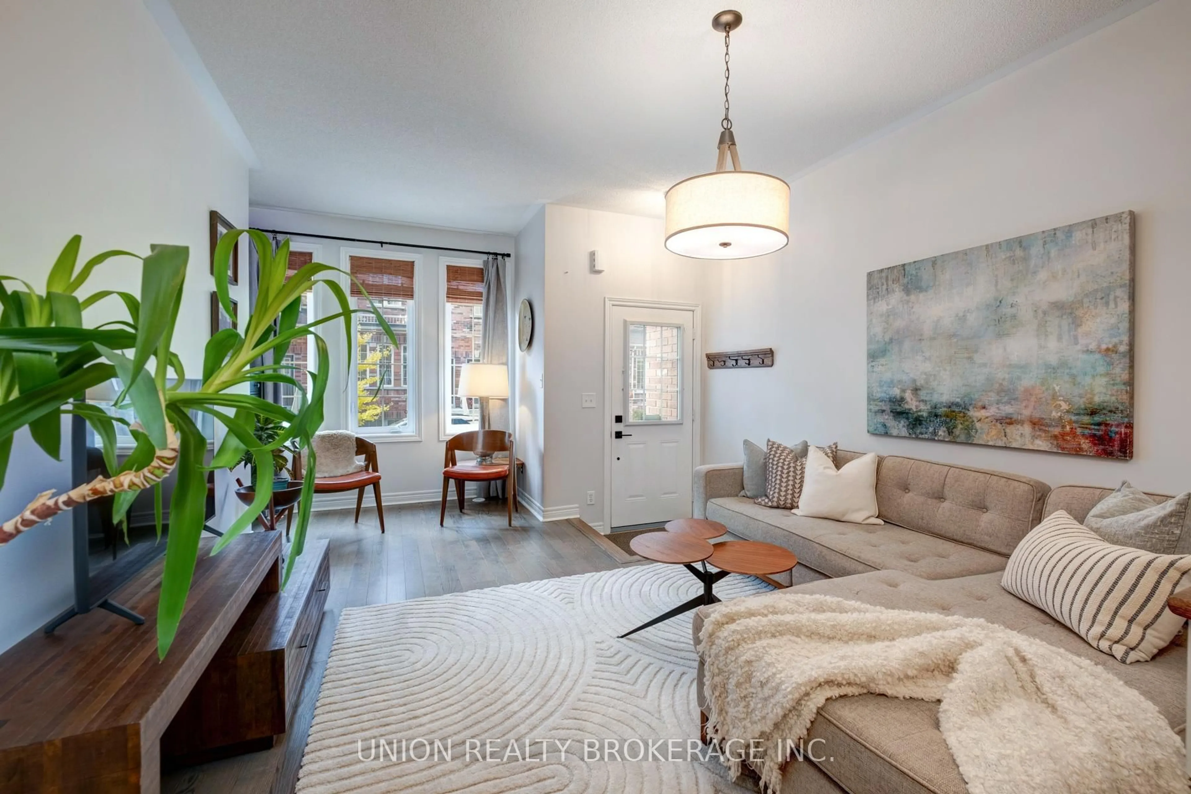 Living room with furniture, unknown for 39 Philpott Gdns, Toronto Ontario M4E 0A8