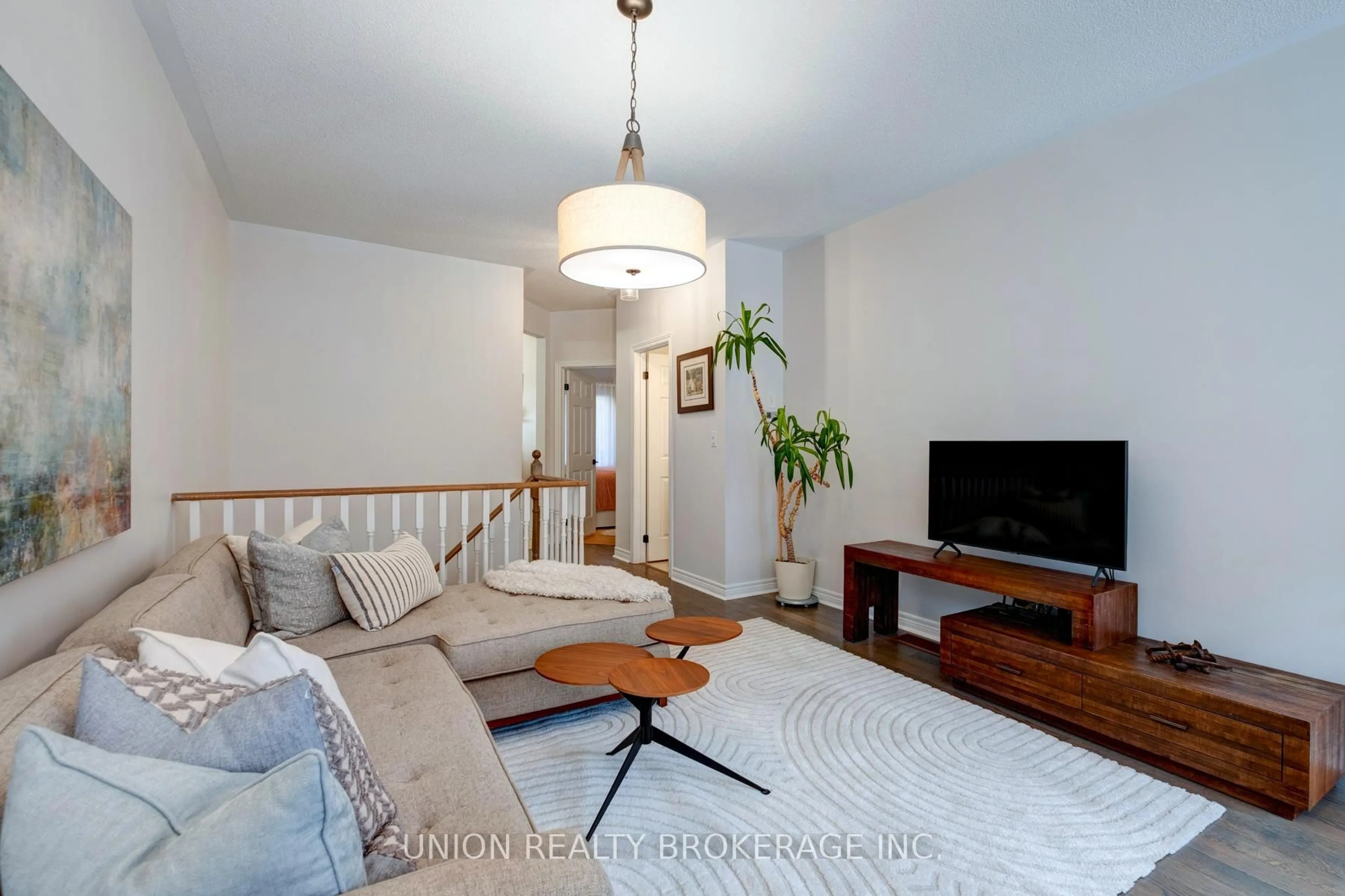 Living room with furniture, unknown for 39 Philpott Gdns, Toronto Ontario M4E 0A8