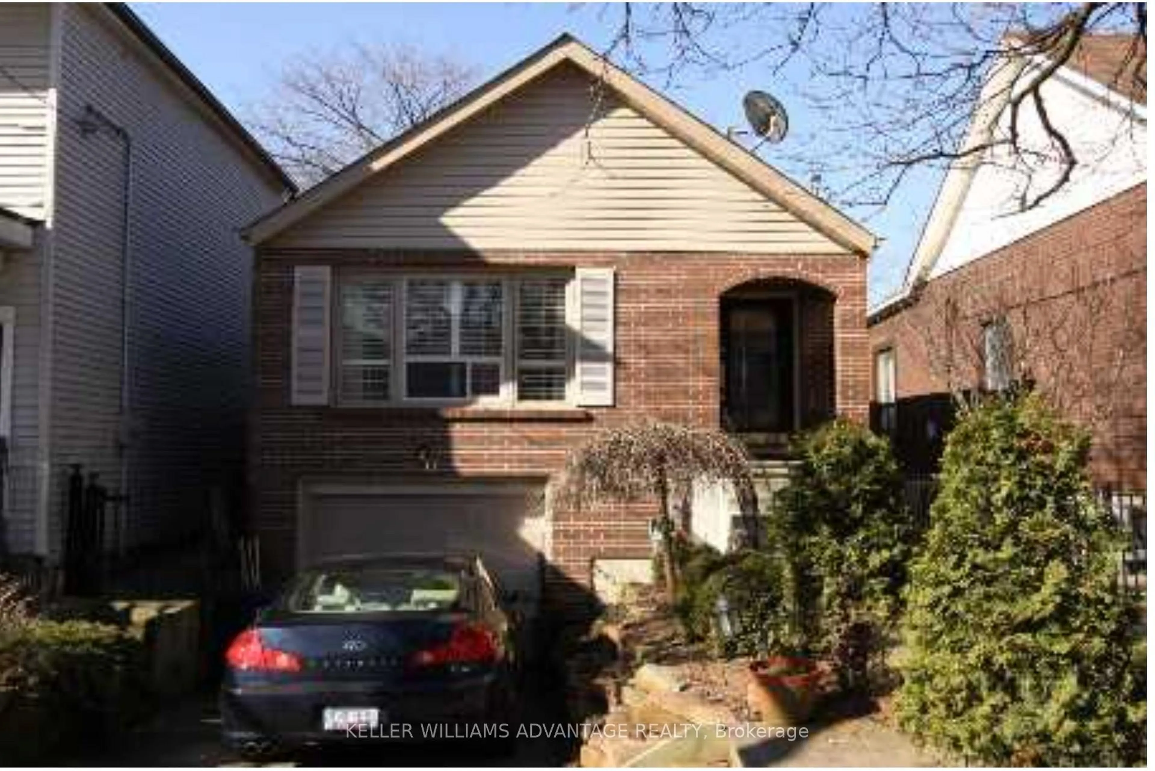 Home with brick exterior material, street for 60 RHODES Ave, Toronto Ontario M4L 2Z9