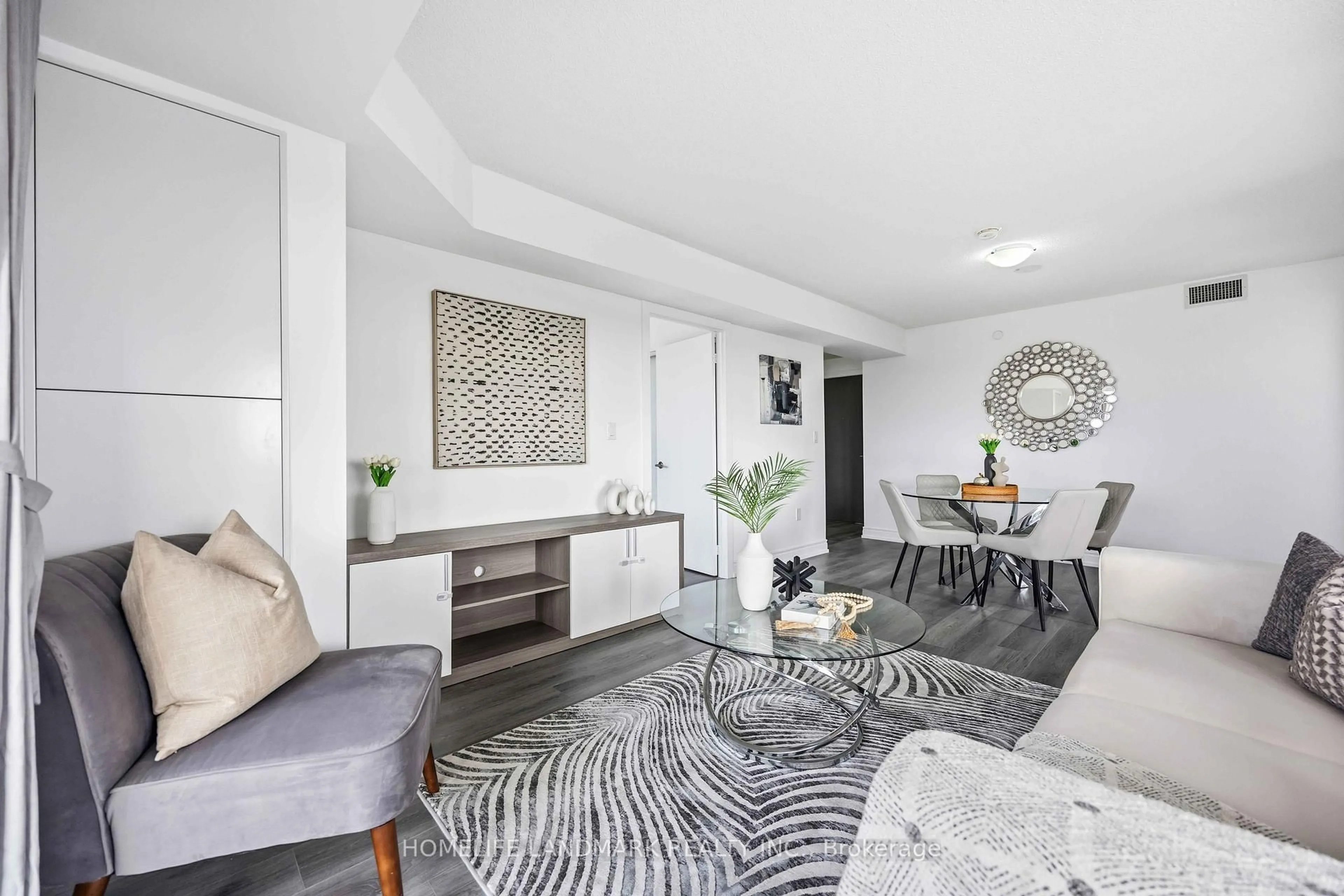 Living room with furniture, unknown for 1346 Danforth Rd #1105, Toronto Ontario M1J 0A9