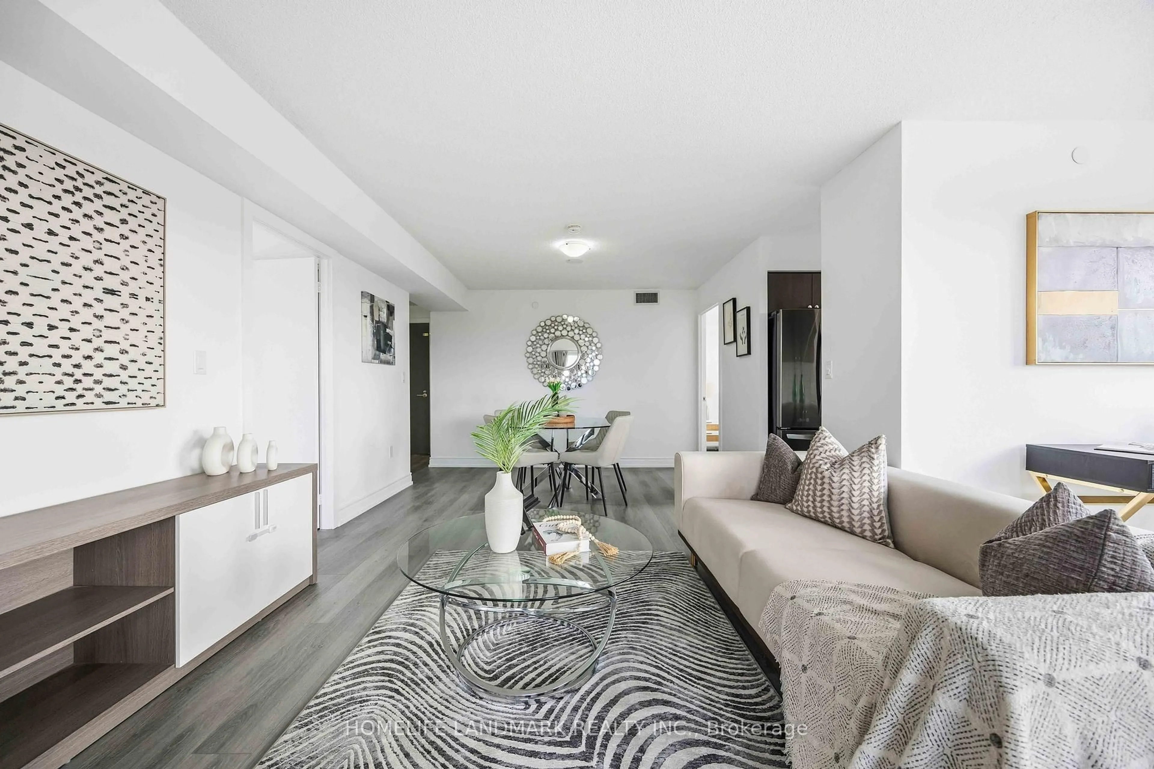 Living room with furniture, unknown for 1346 Danforth Rd #1105, Toronto Ontario M1J 0A9