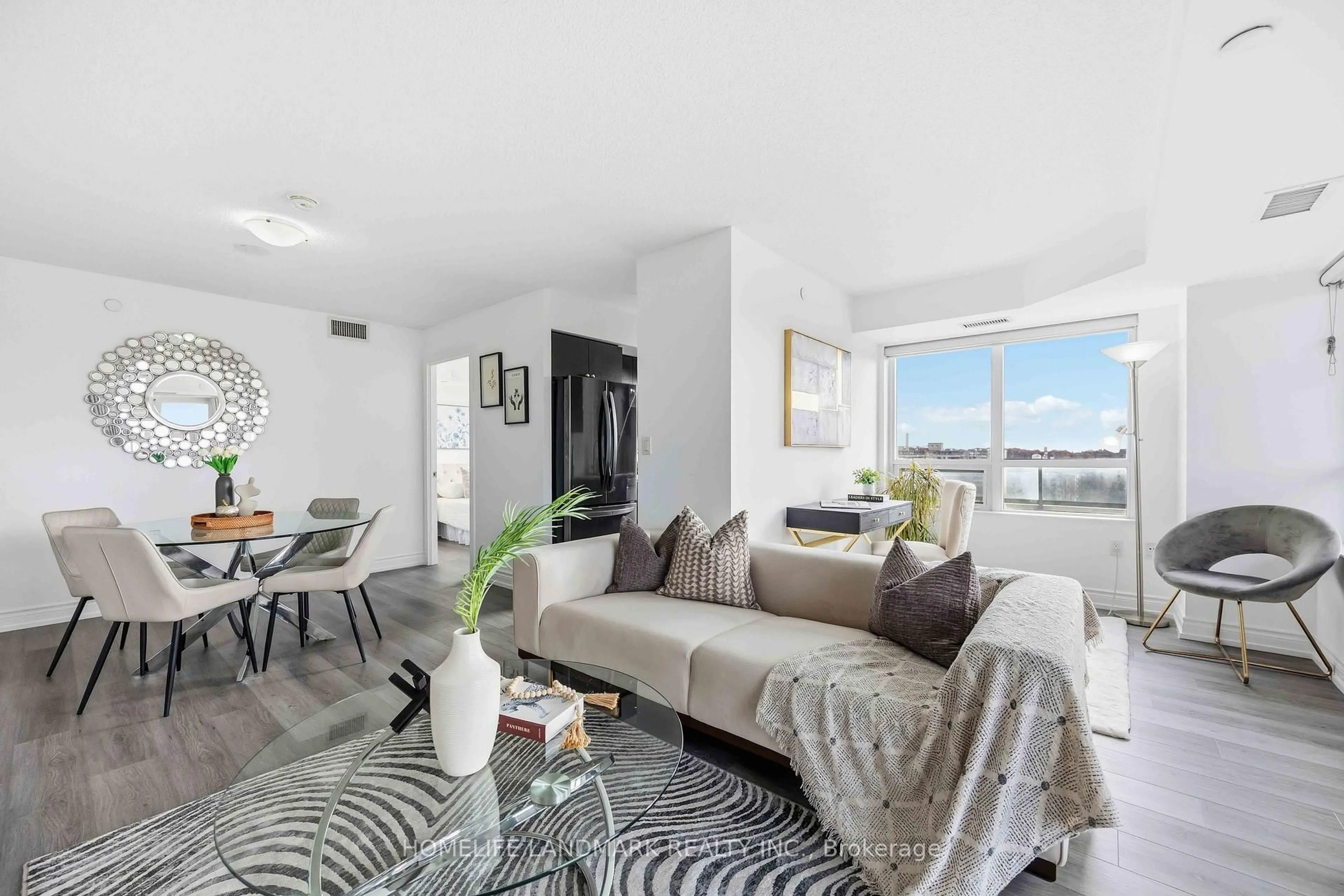 Living room with furniture, unknown for 1346 Danforth Rd #1105, Toronto Ontario M1J 0A9