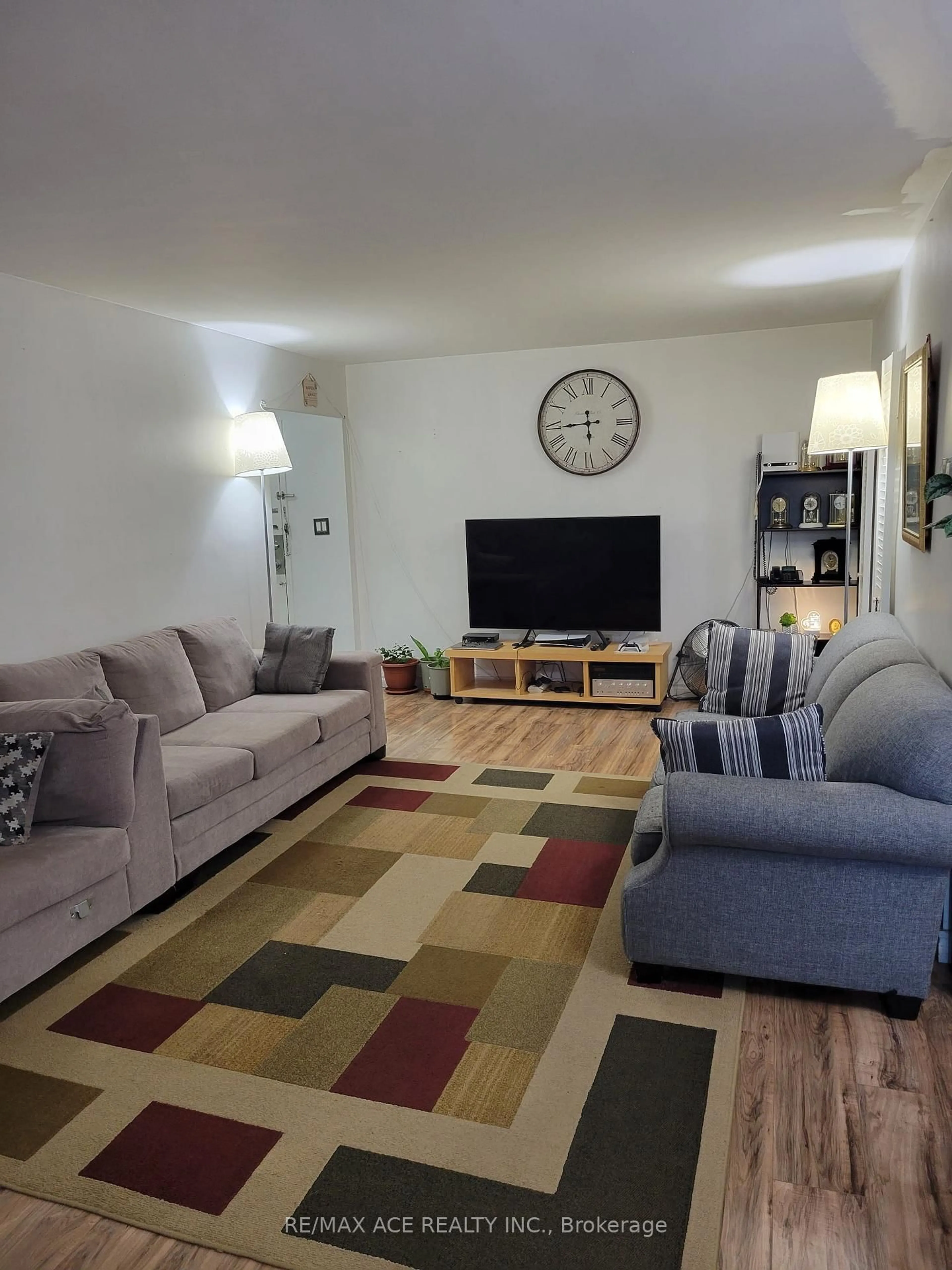 Living room with furniture, unknown for 5 Massey Sq #2011, Toronto Ontario M4C 5L6