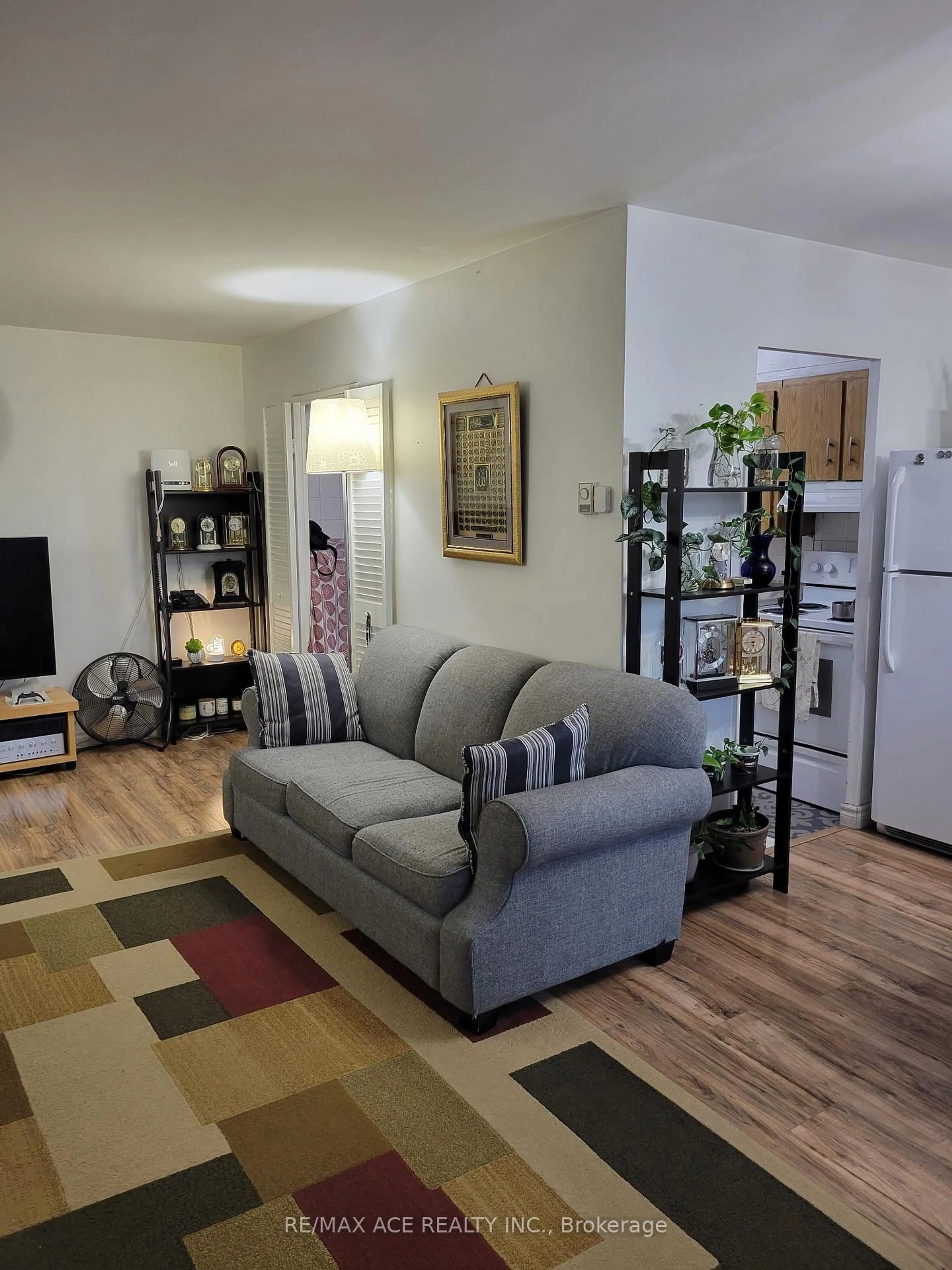 Living room with furniture, unknown for 5 Massey Sq #2011, Toronto Ontario M4C 5L6