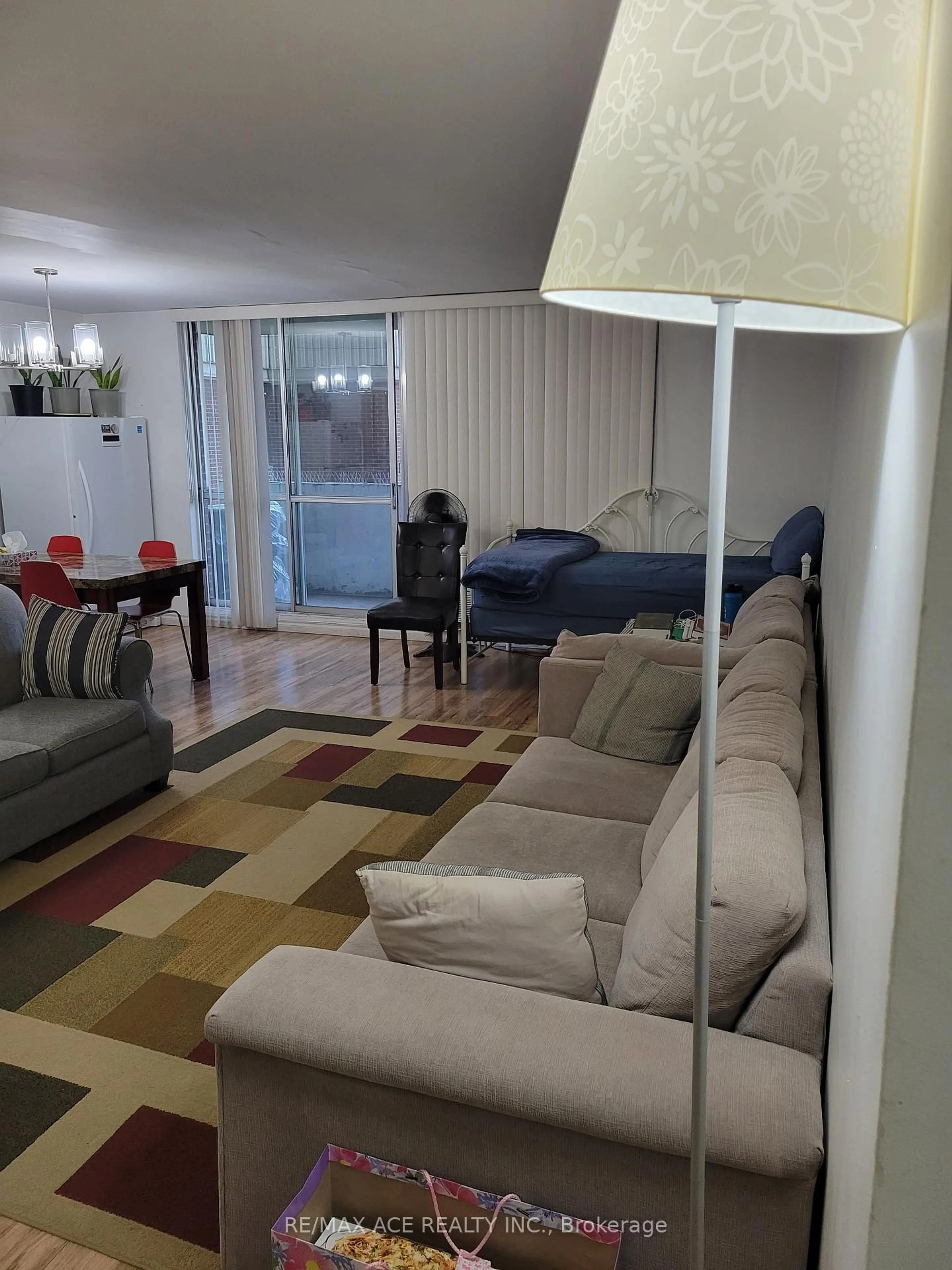 Living room with furniture, unknown for 5 Massey Sq #2011, Toronto Ontario M4C 5L6