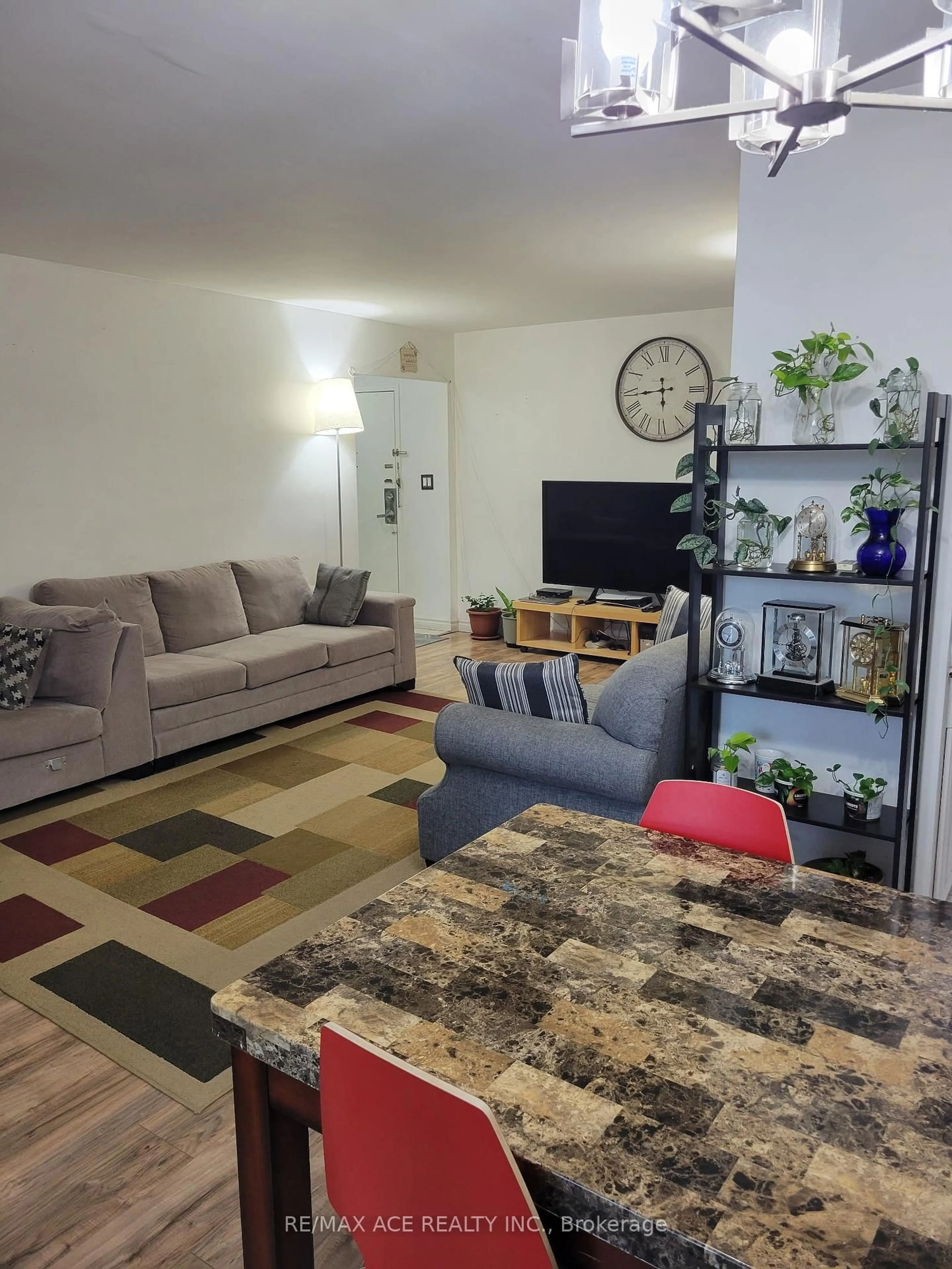 Living room with furniture, unknown for 5 Massey Sq #2011, Toronto Ontario M4C 5L6