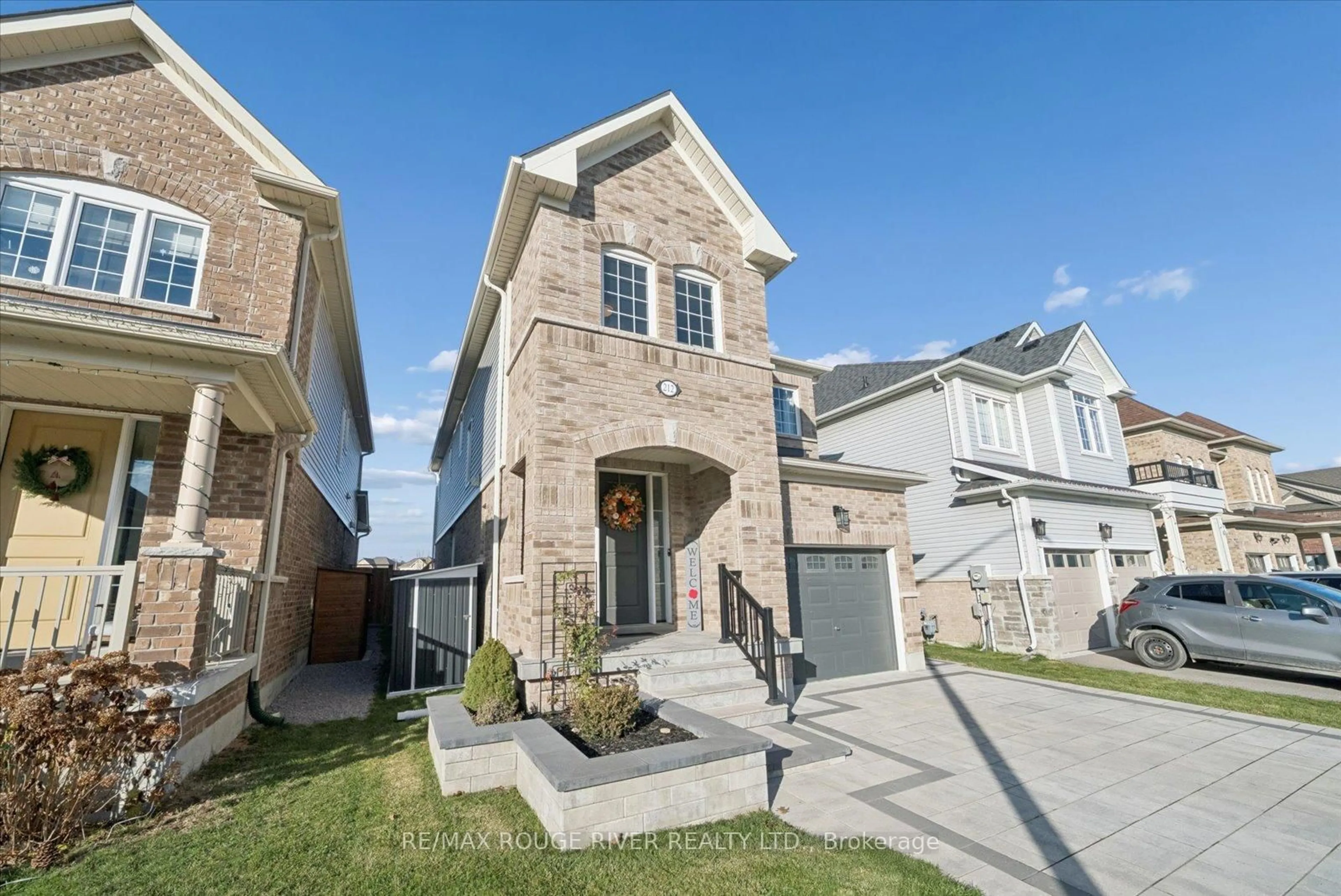 Home with brick exterior material, street for 212 Ronald Hooper Ave, Clarington Ontario L1C 7E3