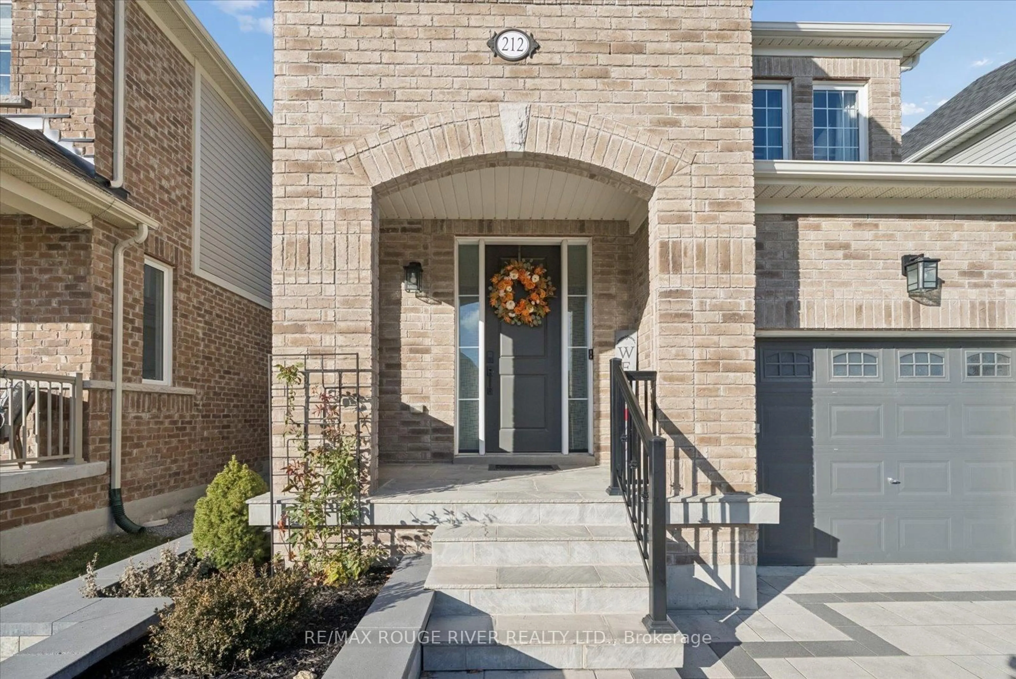 Home with brick exterior material, street for 212 Ronald Hooper Ave, Clarington Ontario L1C 7E3