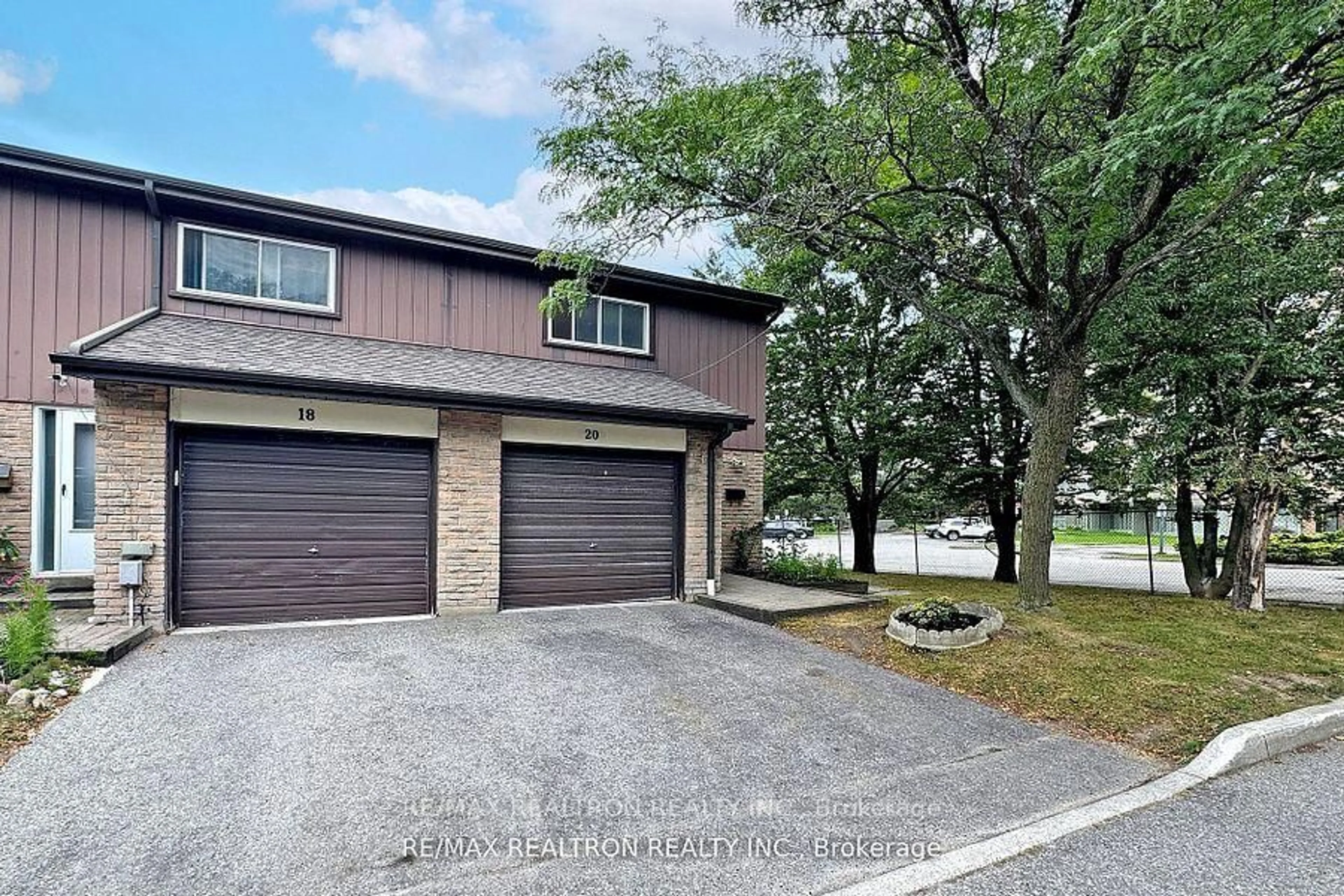 Home with brick exterior material, street for 1121 Sandhurst Circ #20, Toronto Ontario M1V 1V4