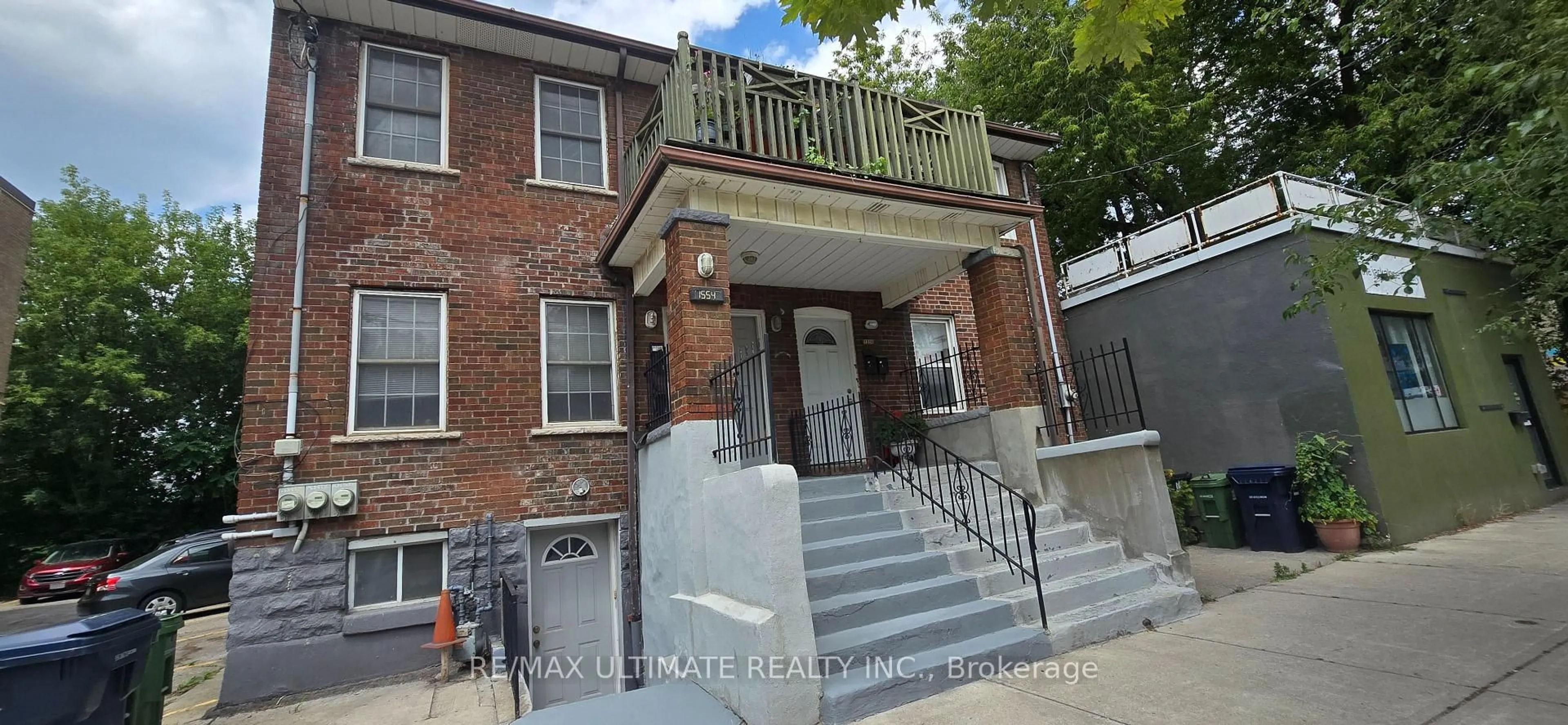 Home with brick exterior material, street for 1554 Queen St, Toronto Ontario M4L 1E8