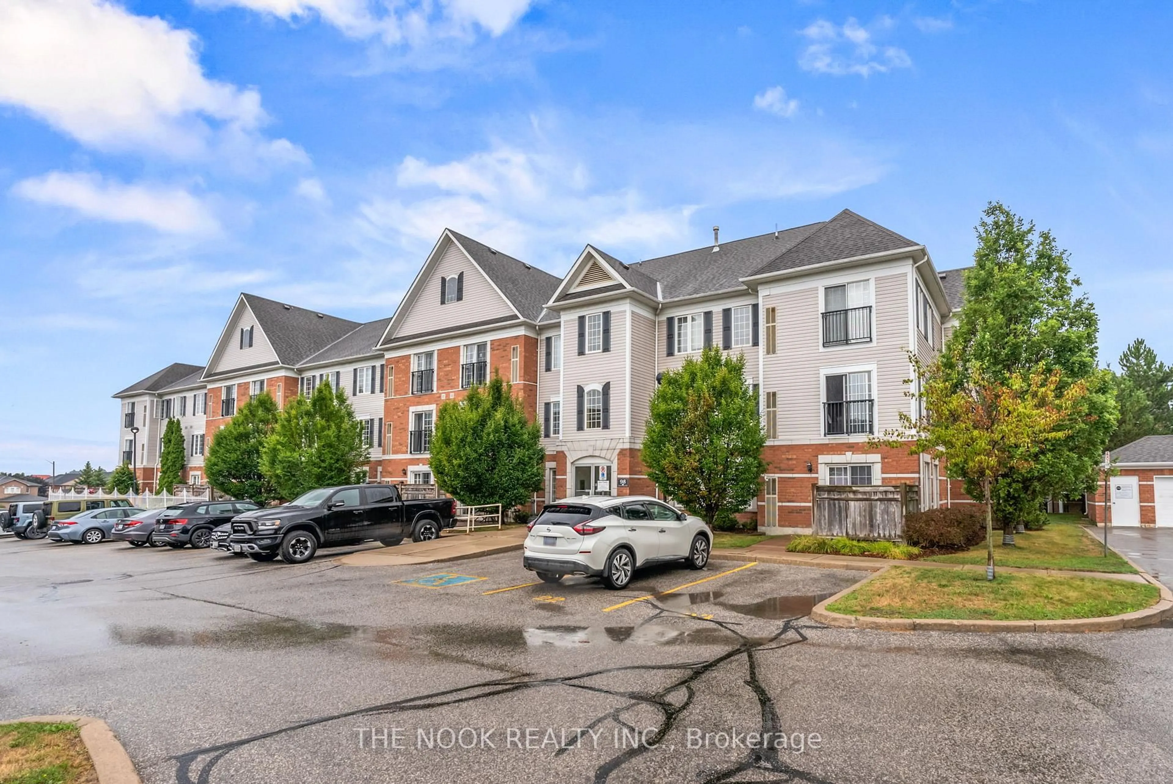 A pic from outside/outdoor area/front of a property/back of a property/a pic from drone, unknown for 98 Aspen Springs Dr #310, Clarington Ontario L1C 5N5