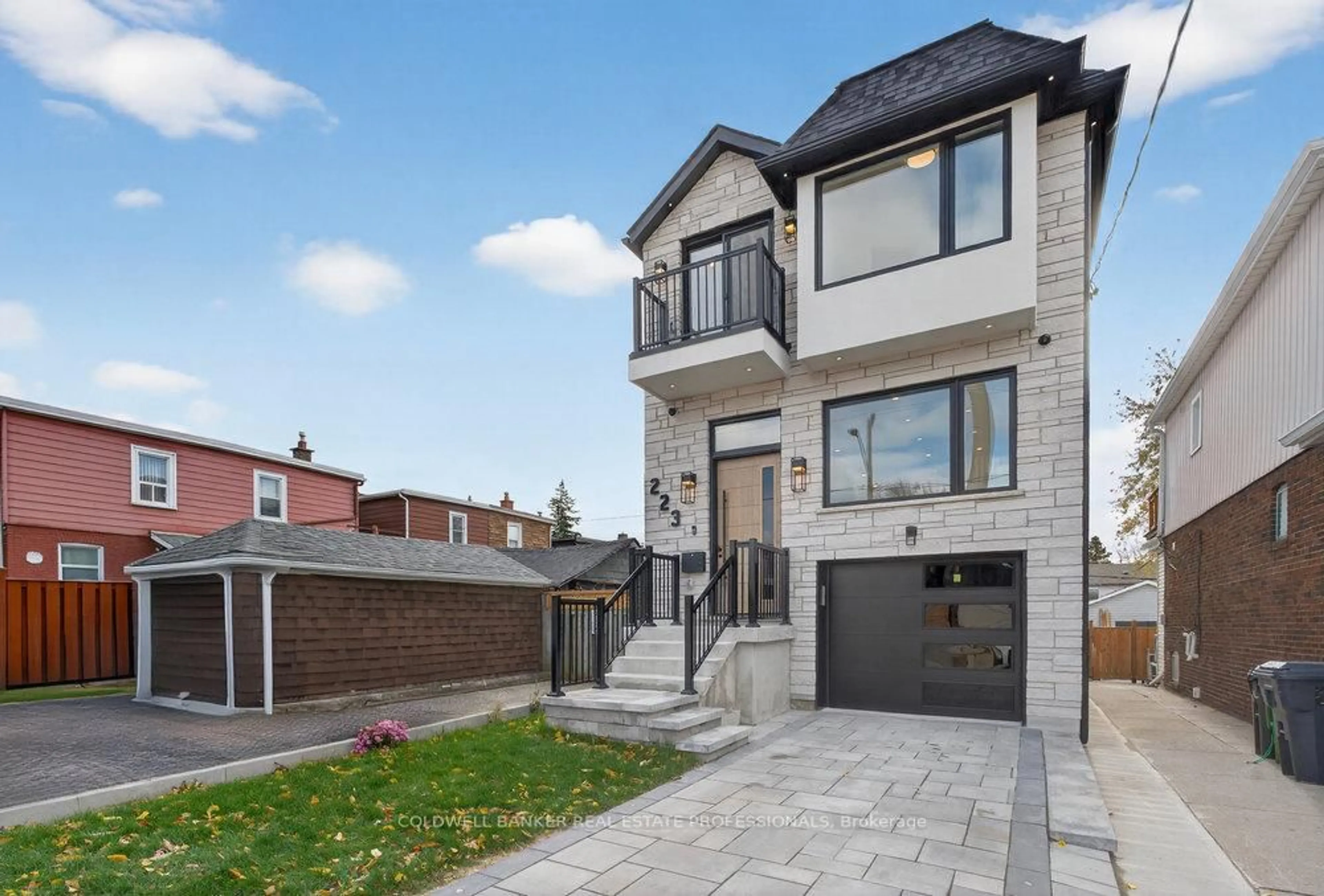 Home with brick exterior material, street for 223 Queensdale Ave, Toronto Ontario M4C 2B1