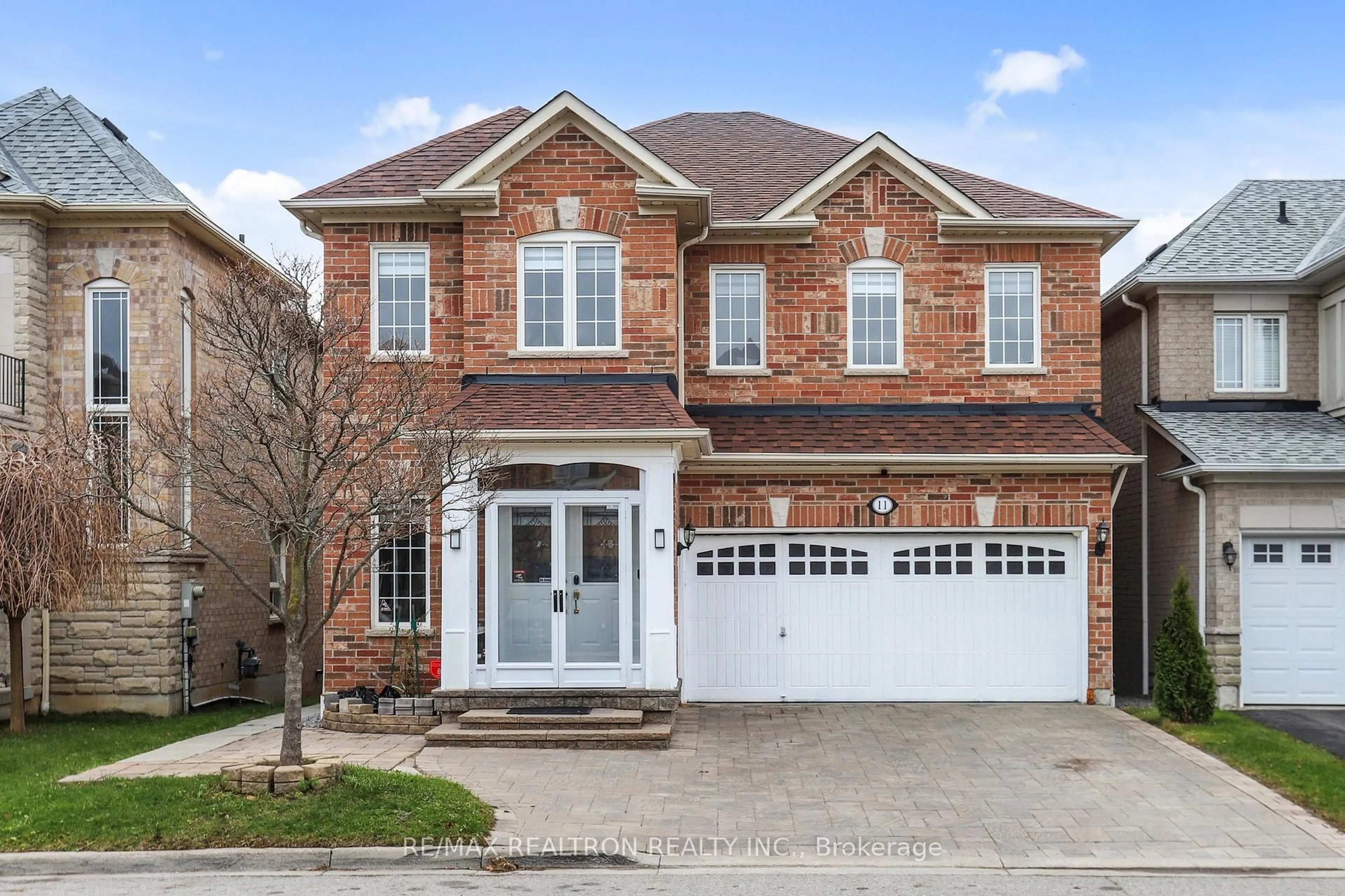 Home with brick exterior material, street for 11 Durling Rock St, Ajax Ontario L1Z 1S6