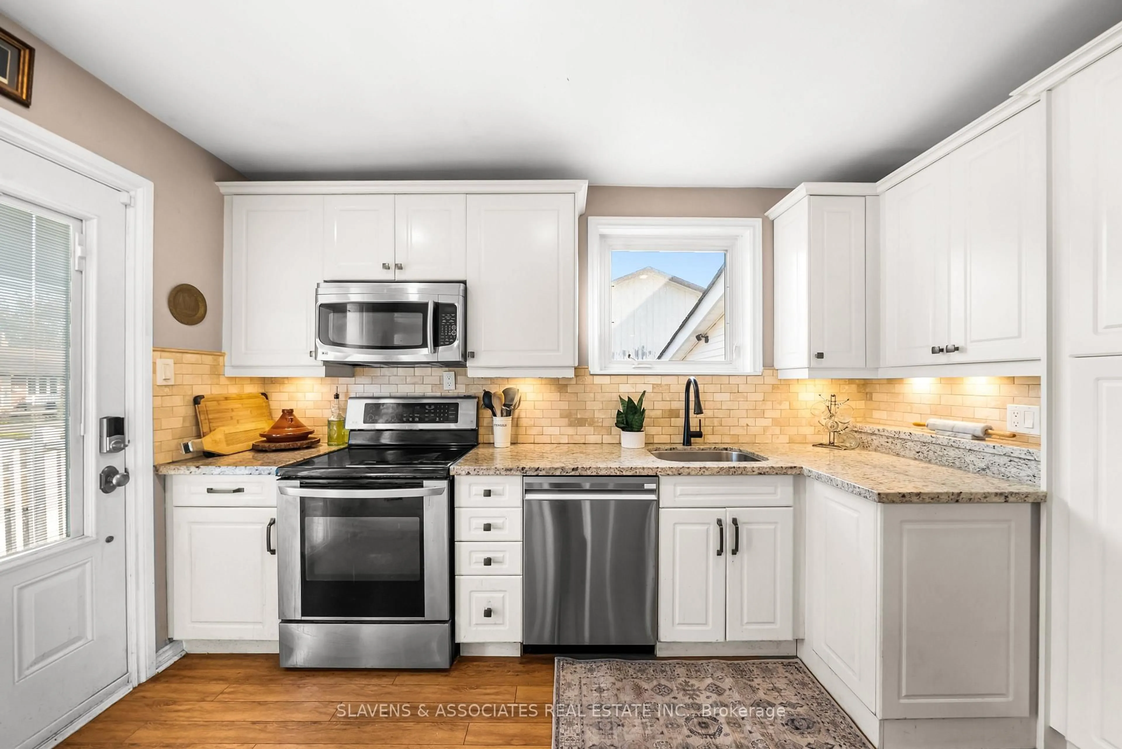 Open concept kitchen, ceramic/tile floor for 48 Billingsgate Cres, Ajax Ontario L1S 2R8