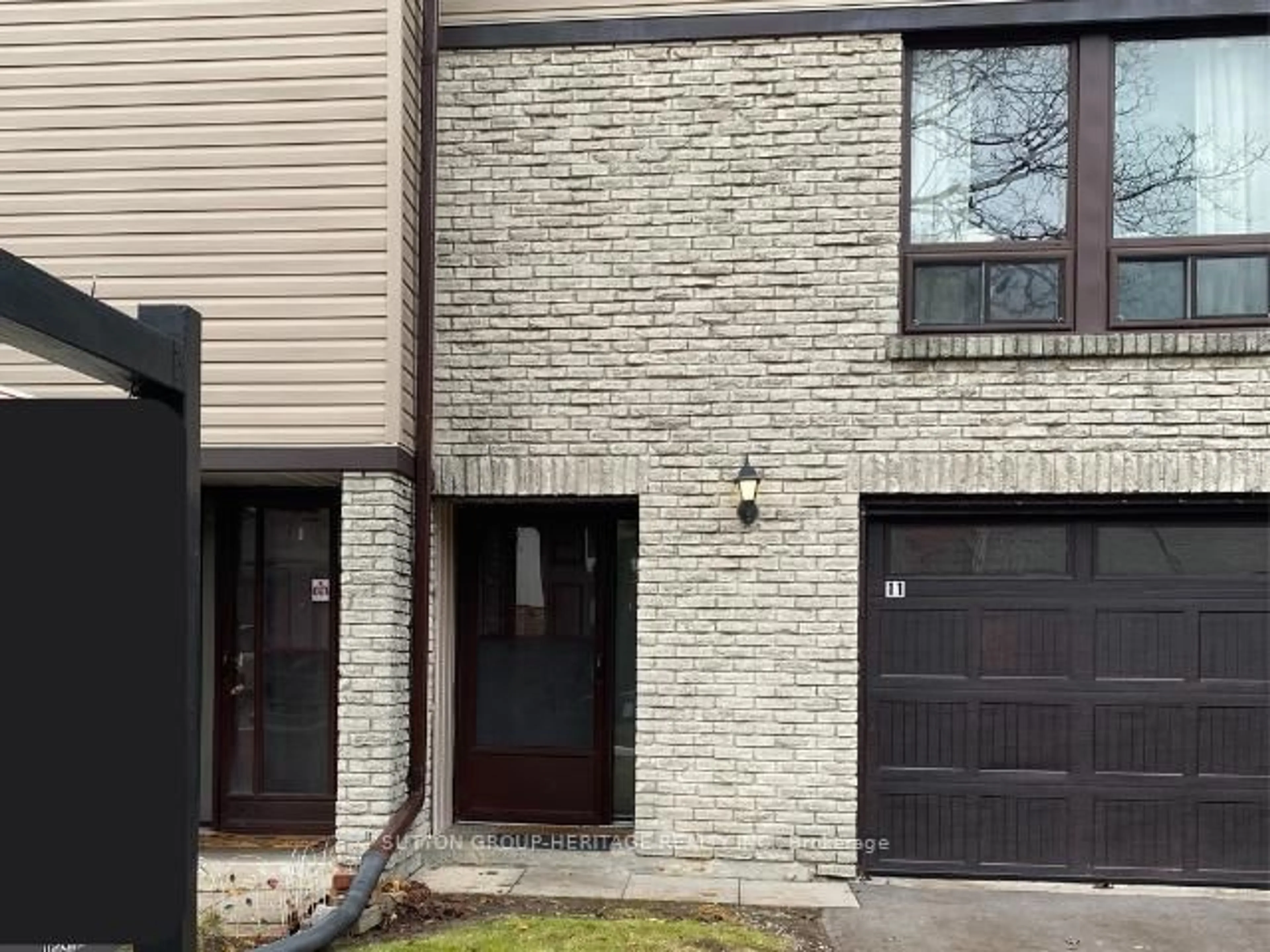 Home with brick exterior material, street for 221 Ormond Dr #11, Oshawa Ontario L1G 6T7