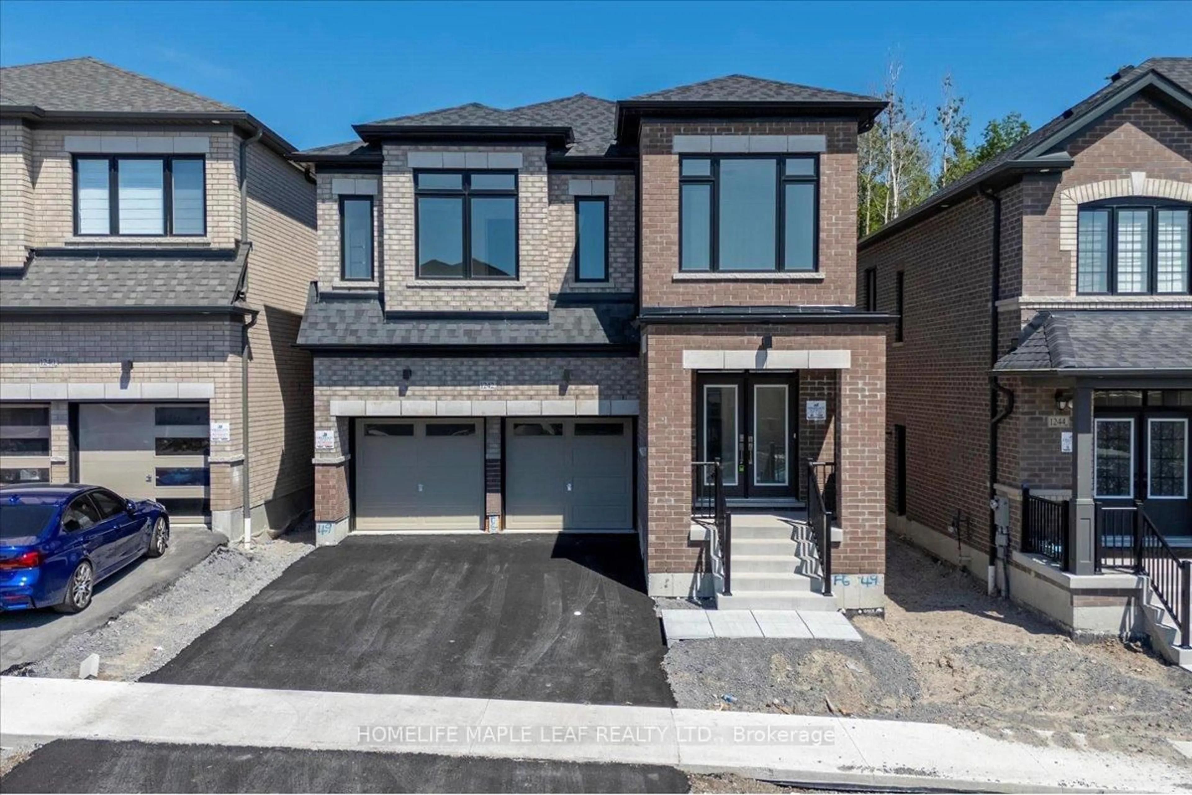 Home with brick exterior material, street for 1242 Talisman Manr, Pickering Ontario L1X 0R8