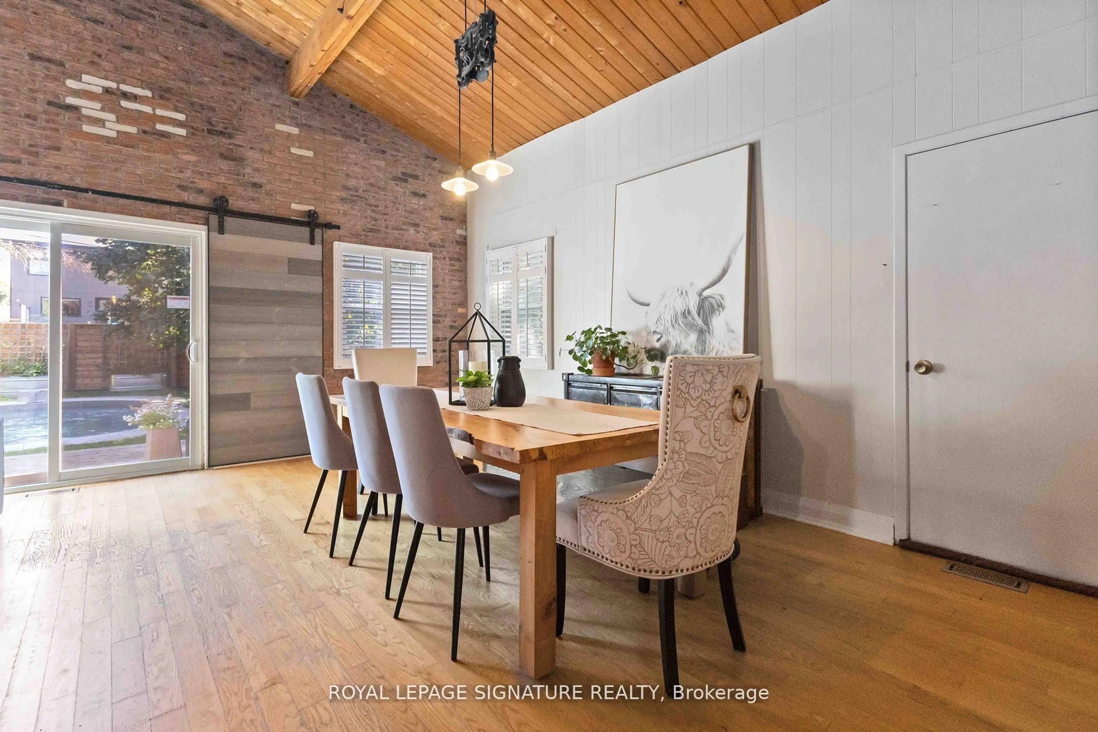 Dining room, wood/laminate floor for 83 Harewood Ave, Toronto Ontario M1M 2R4