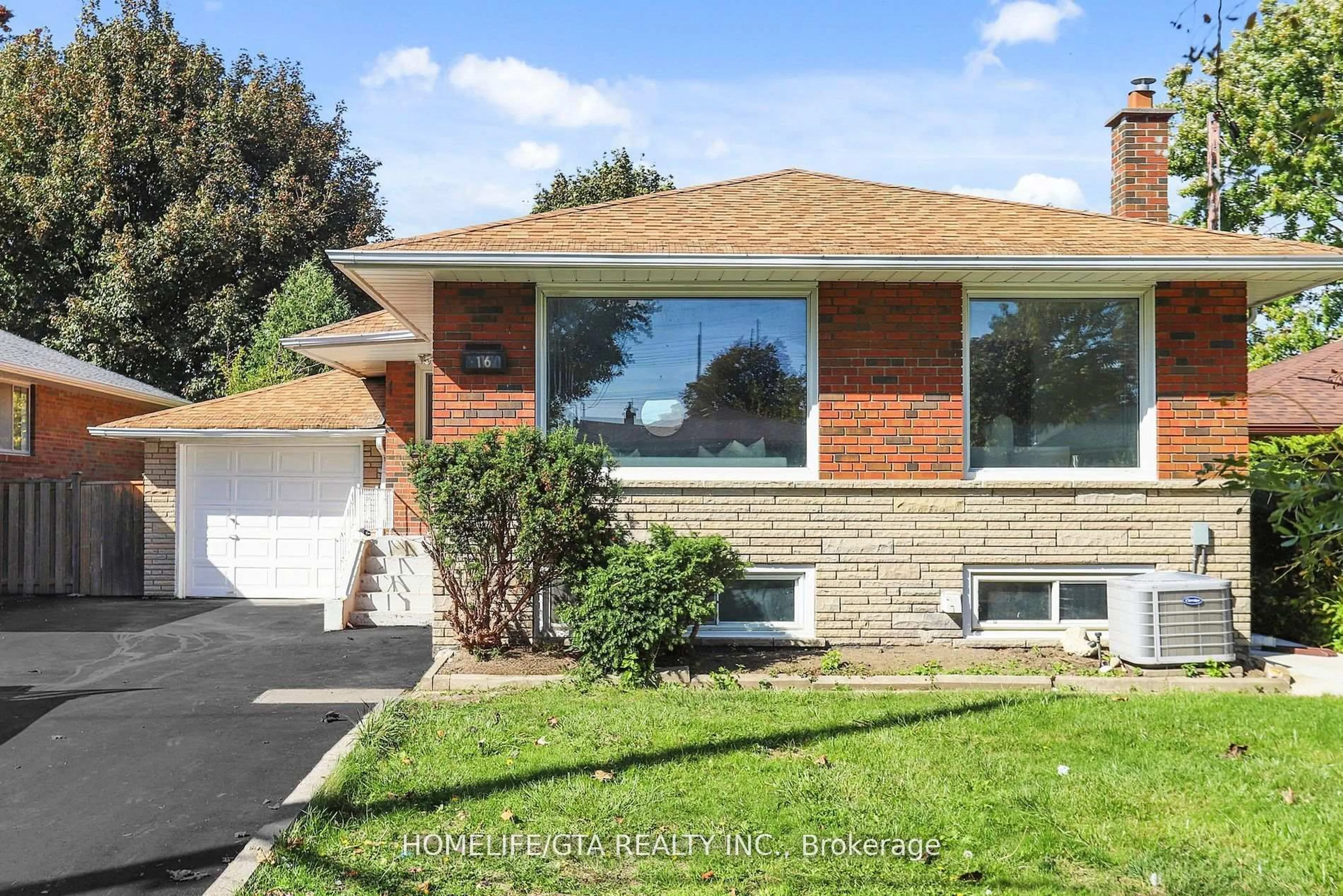 Home with brick exterior material, street for 16 Woolwick Dr, Toronto Ontario M1H 2J1