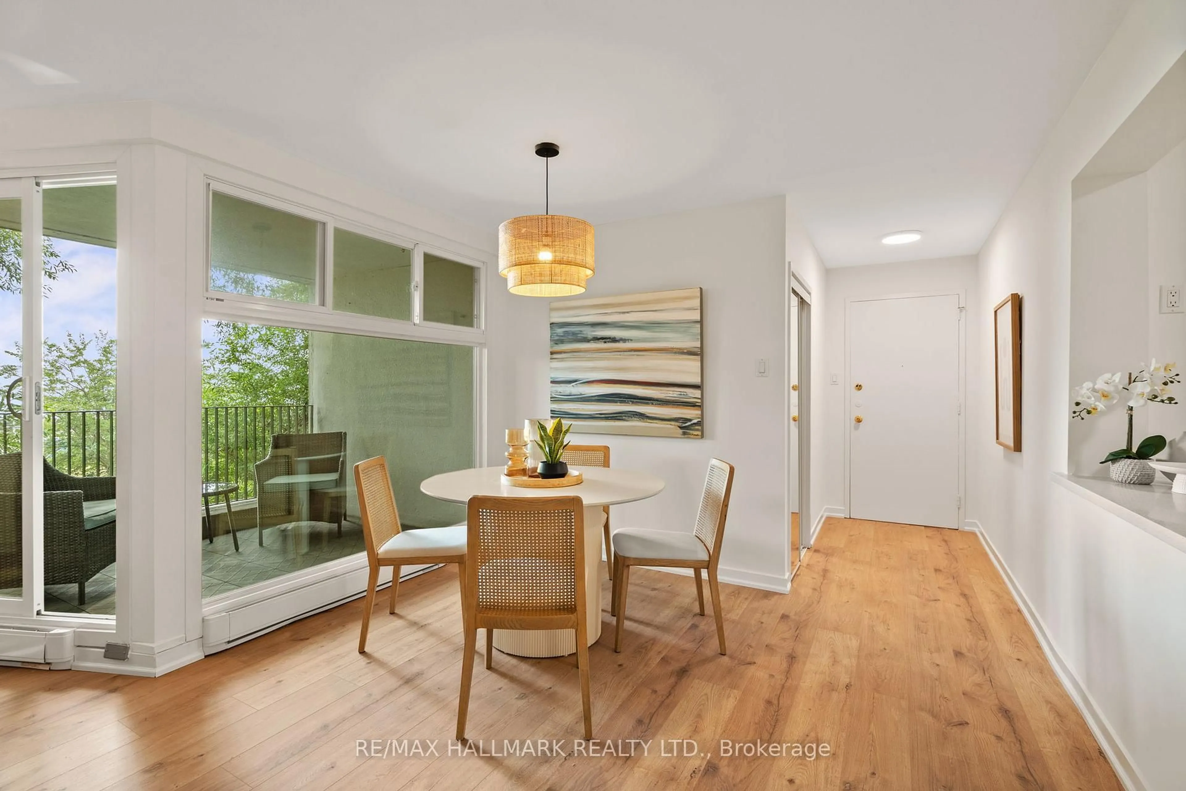 Dining room, wood/laminate floor for 2 Nursewood Rd #6, Toronto Ontario M4E 3R8