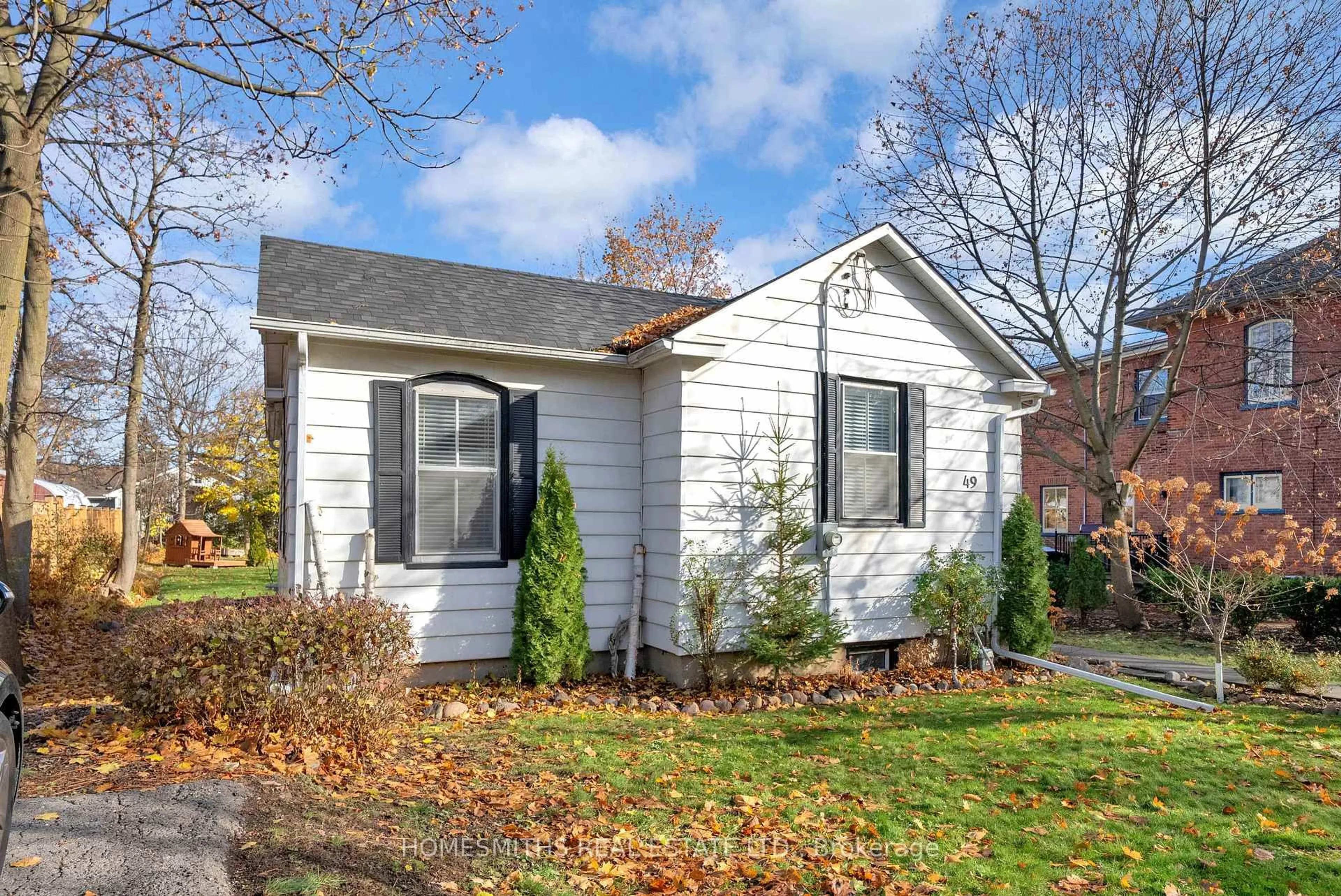 Home with vinyl exterior material, street for 49 Centre St, Clarington Ontario L1C 2Y2