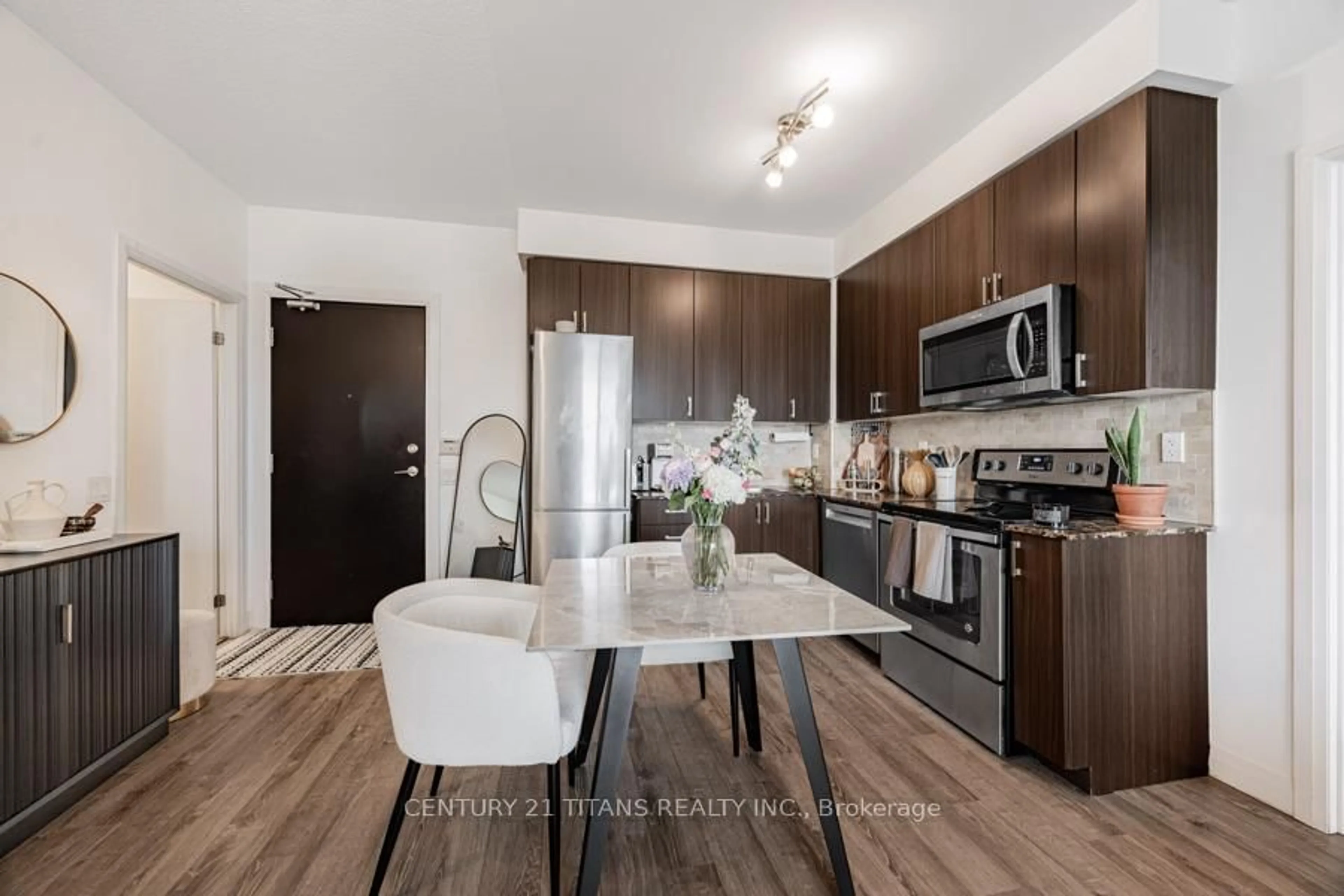 Open concept kitchen, wood/laminate floor for 22 East Haven Dr #1022, Toronto Ontario M1N 0B4