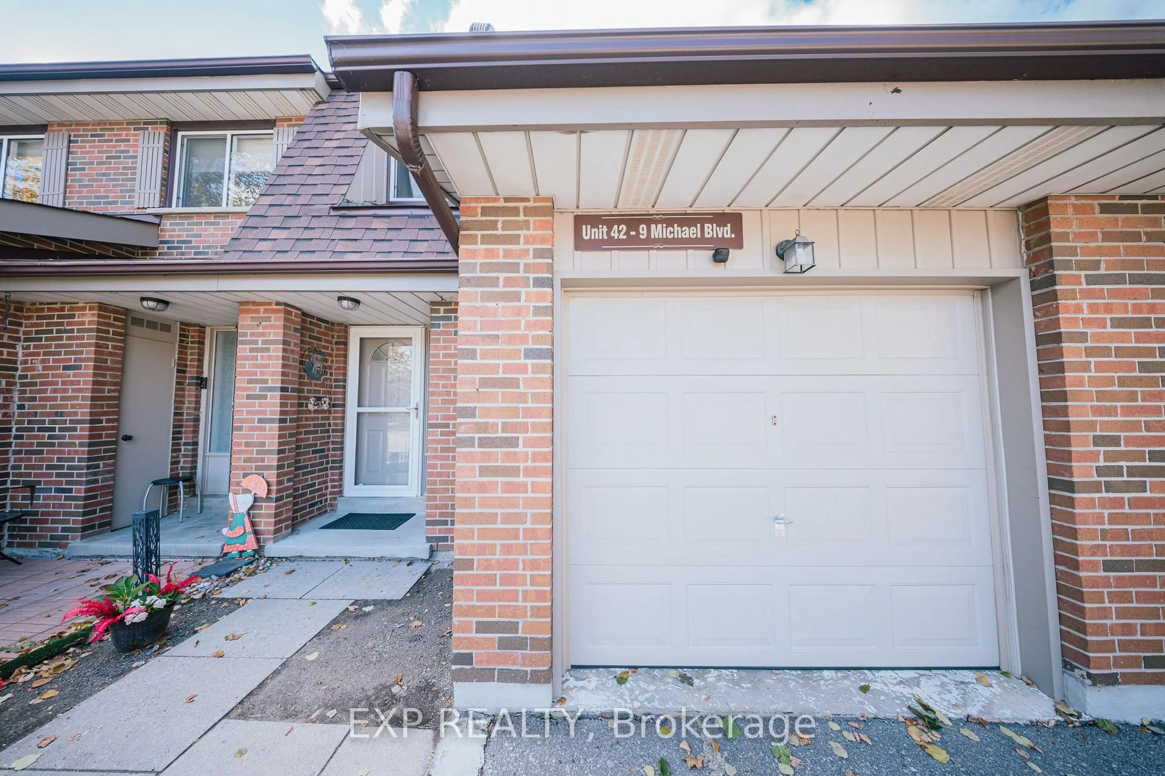 Home with brick exterior material, street for 9 Michael Blvd #42, Whitby Ontario L1N 5P4