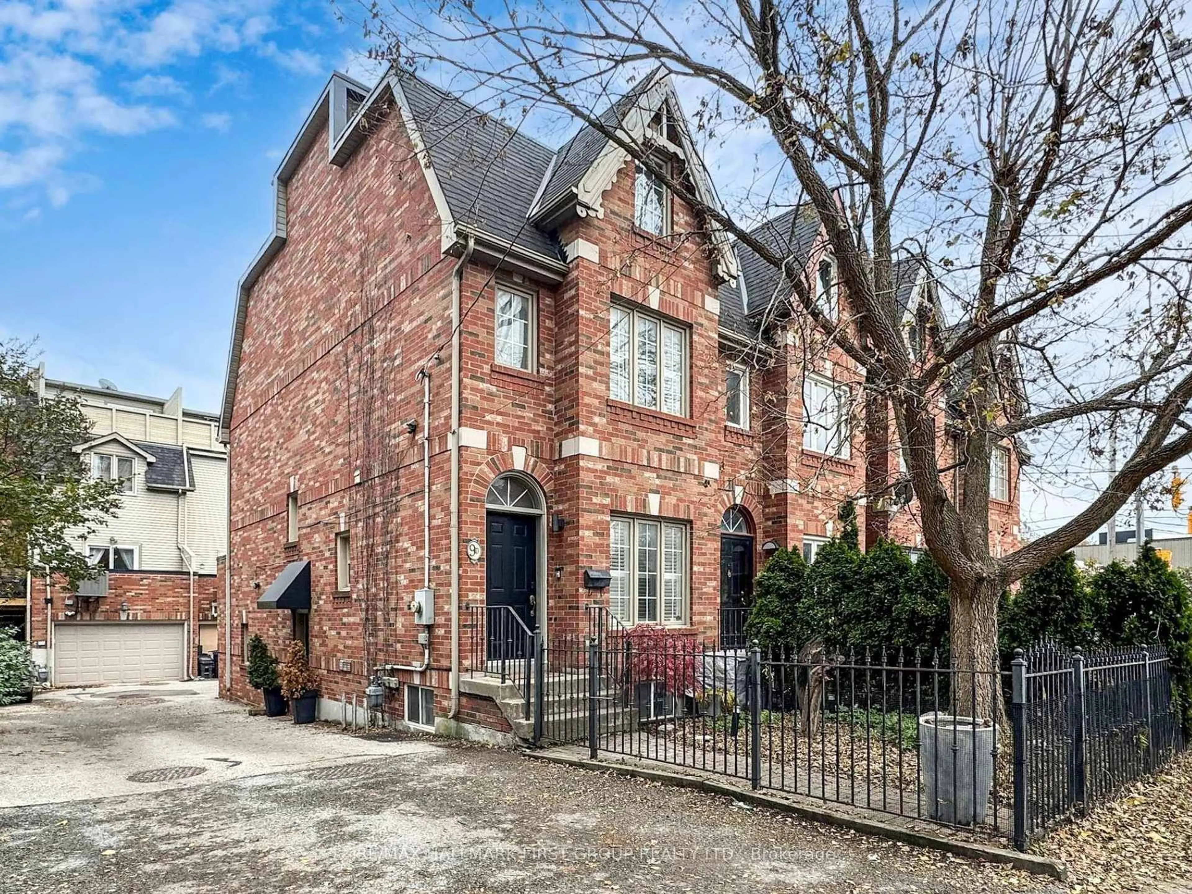 Home with brick exterior material, street for 9D Woodfield Rd, Toronto Ontario M4L 2W4