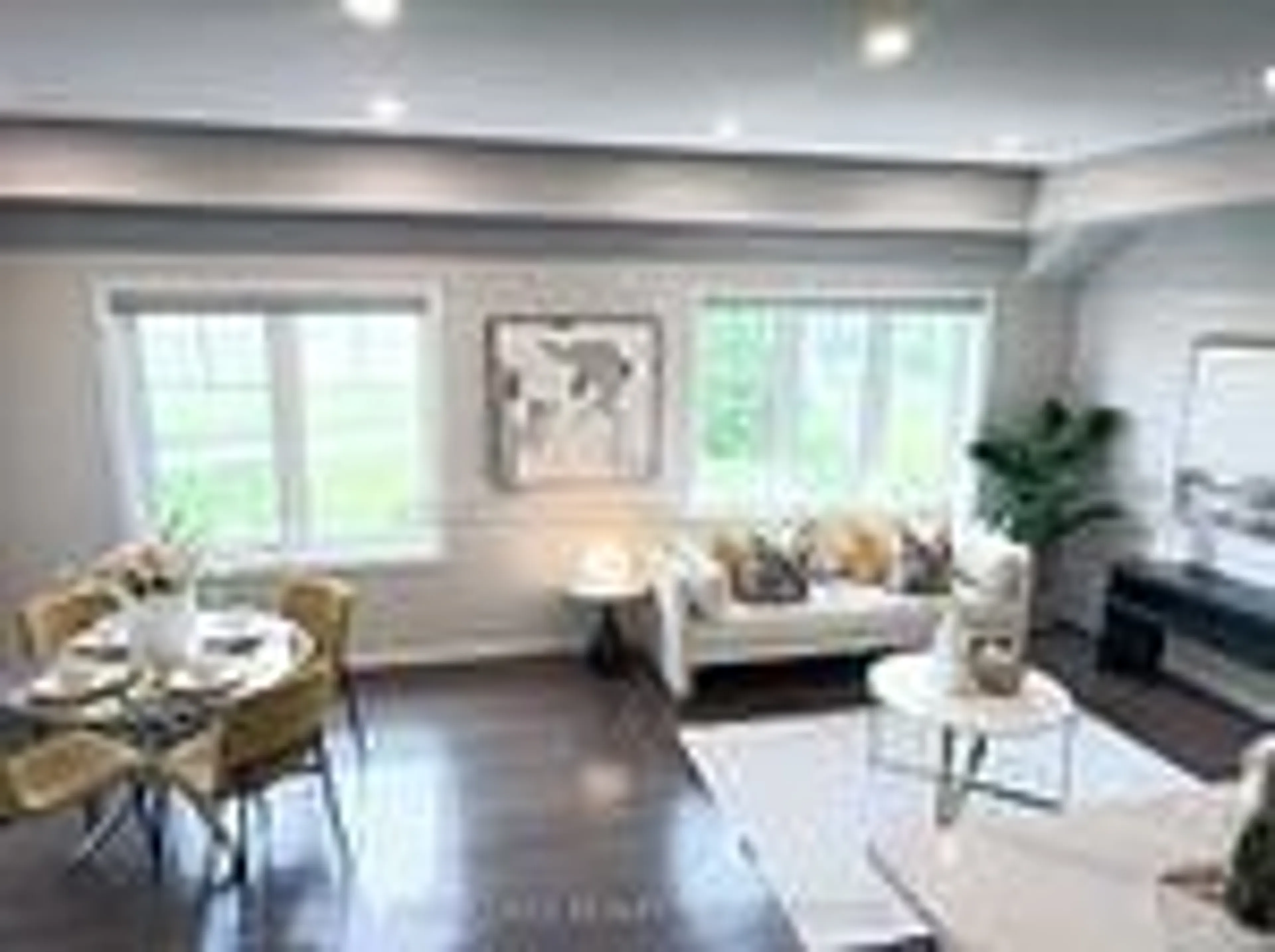 Living room with furniture, wood/laminate floor for 13 Eaton Park Lane #16, Toronto Ontario M1W 0A5