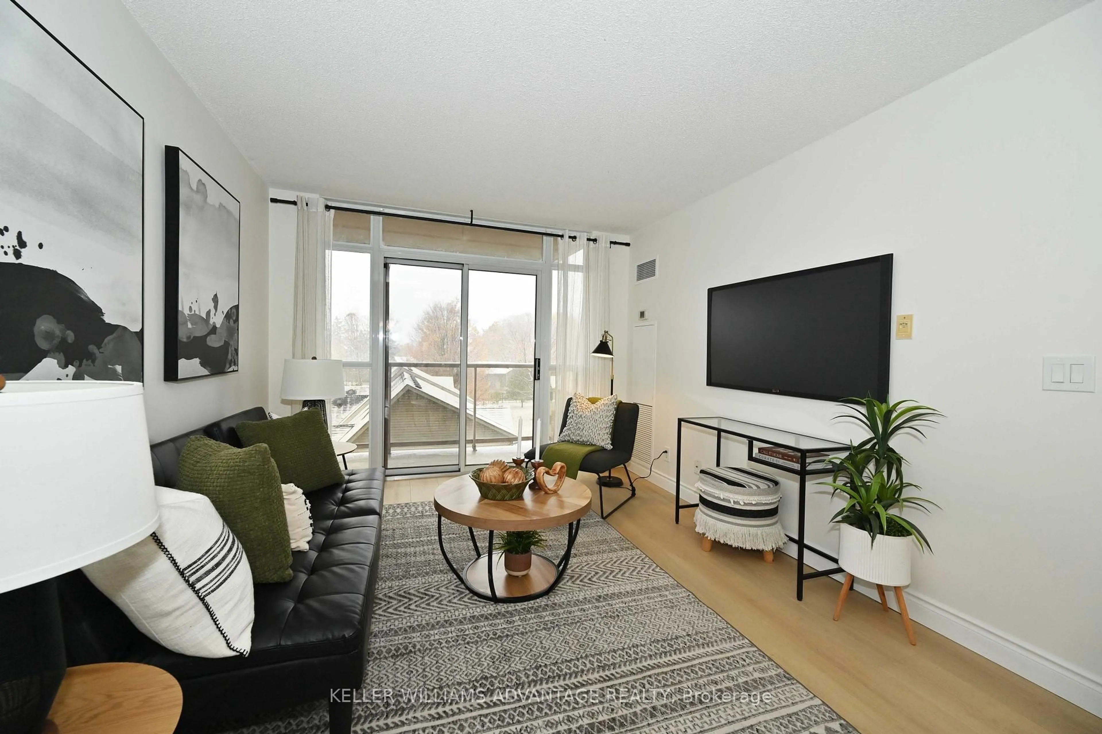 Living room with furniture, unknown for 3650 Kingston Rd #516, Toronto Ontario M1M 3X9