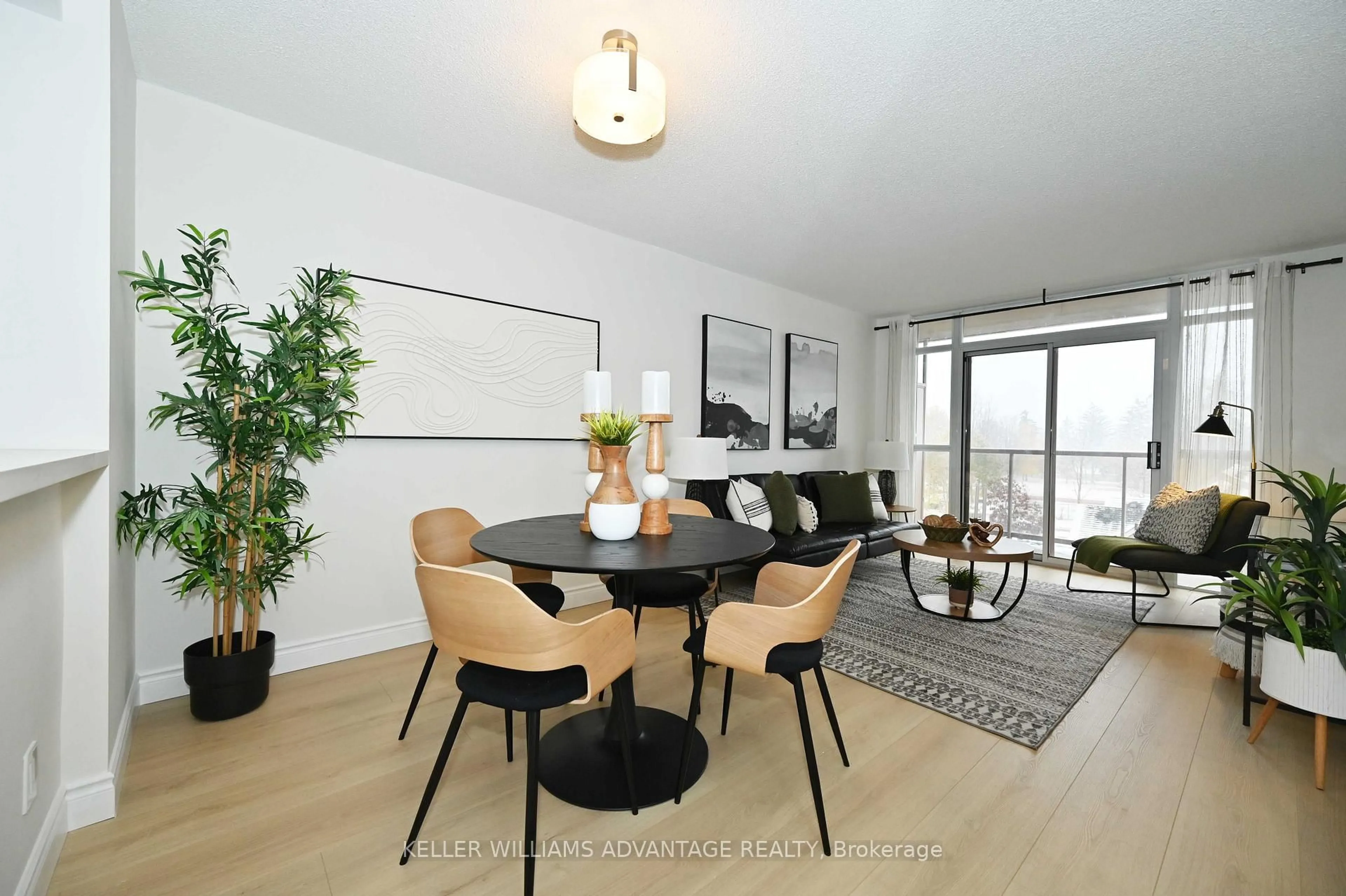 Dining room, wood/laminate floor for 3650 Kingston Rd #516, Toronto Ontario M1M 3X9