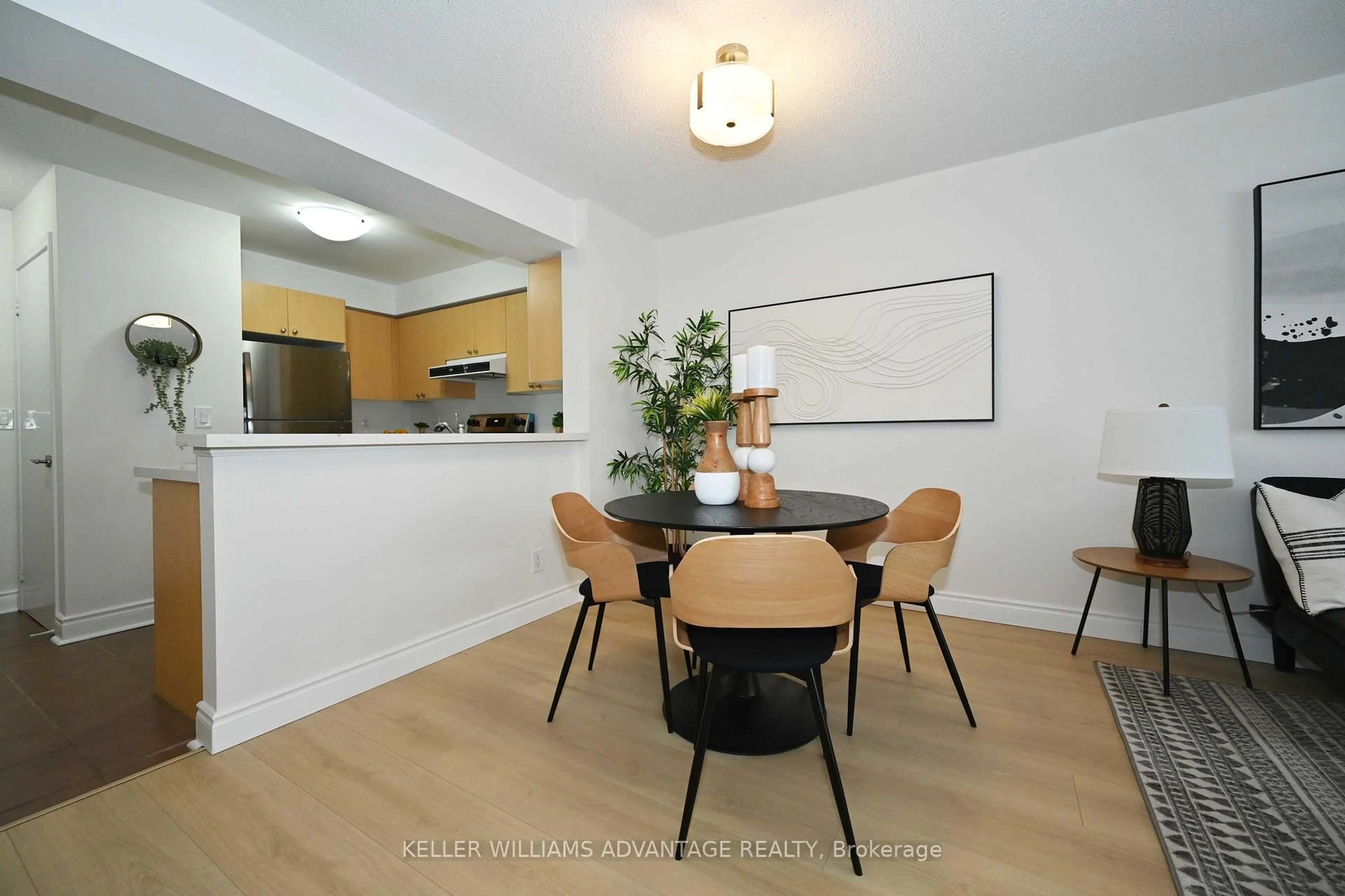 Dining room, wood/laminate floor for 3650 Kingston Rd #516, Toronto Ontario M1M 3X9