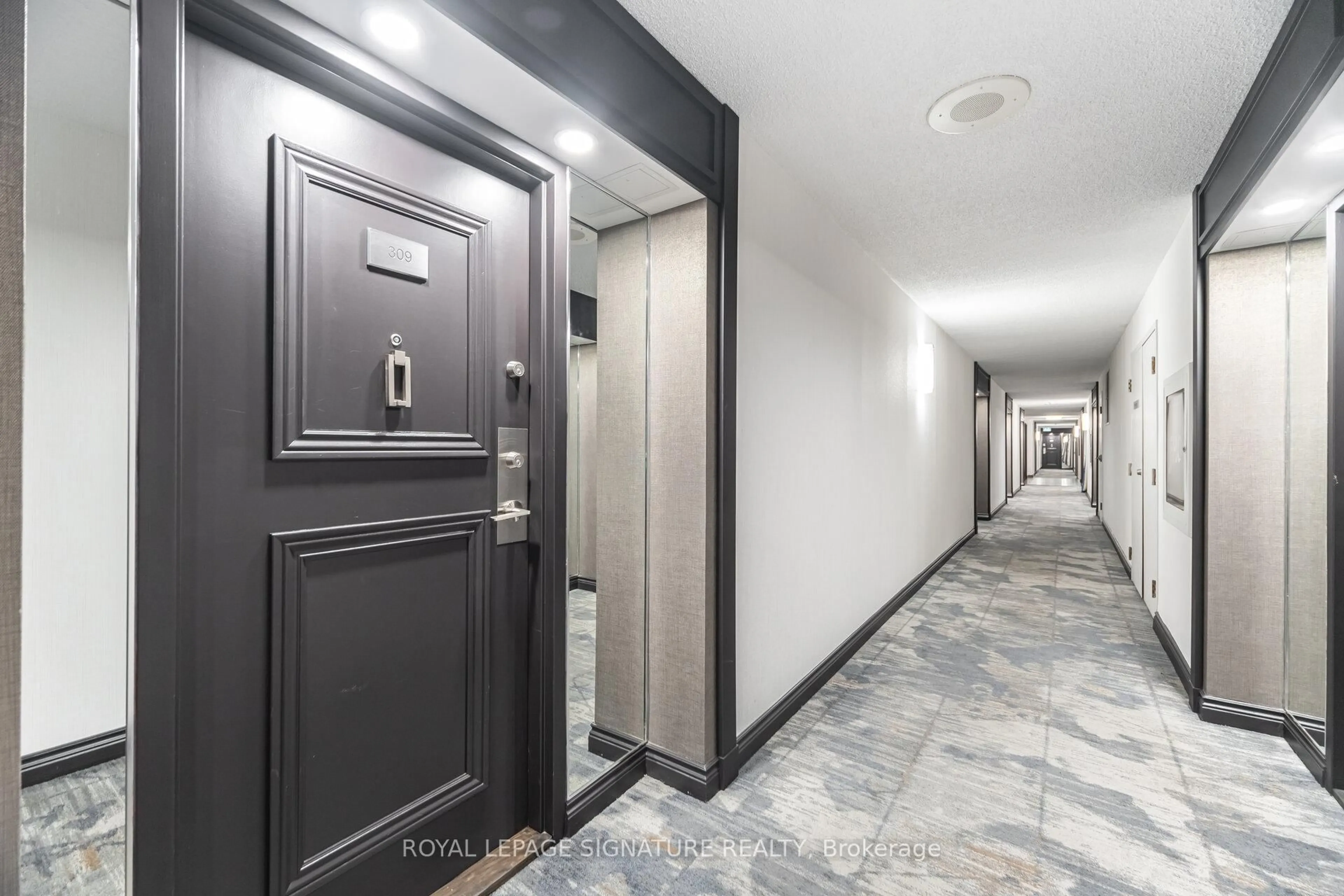 Indoor foyer for 275 Bamburgh Circ #309, Toronto Ontario M1W 3X4