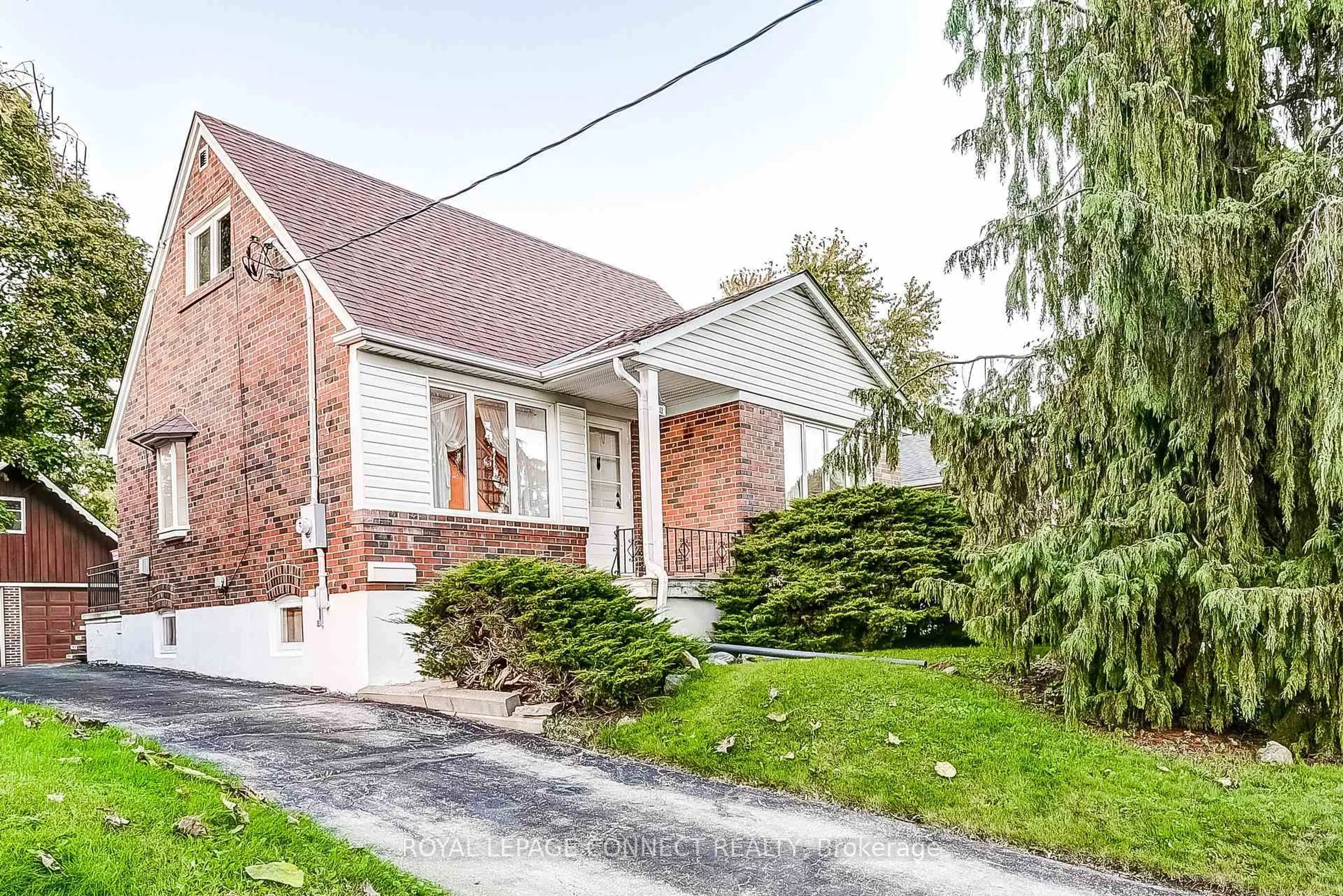 Home with brick exterior material, street for 11 Waringstown Dr, Toronto Ontario M1R 4H2
