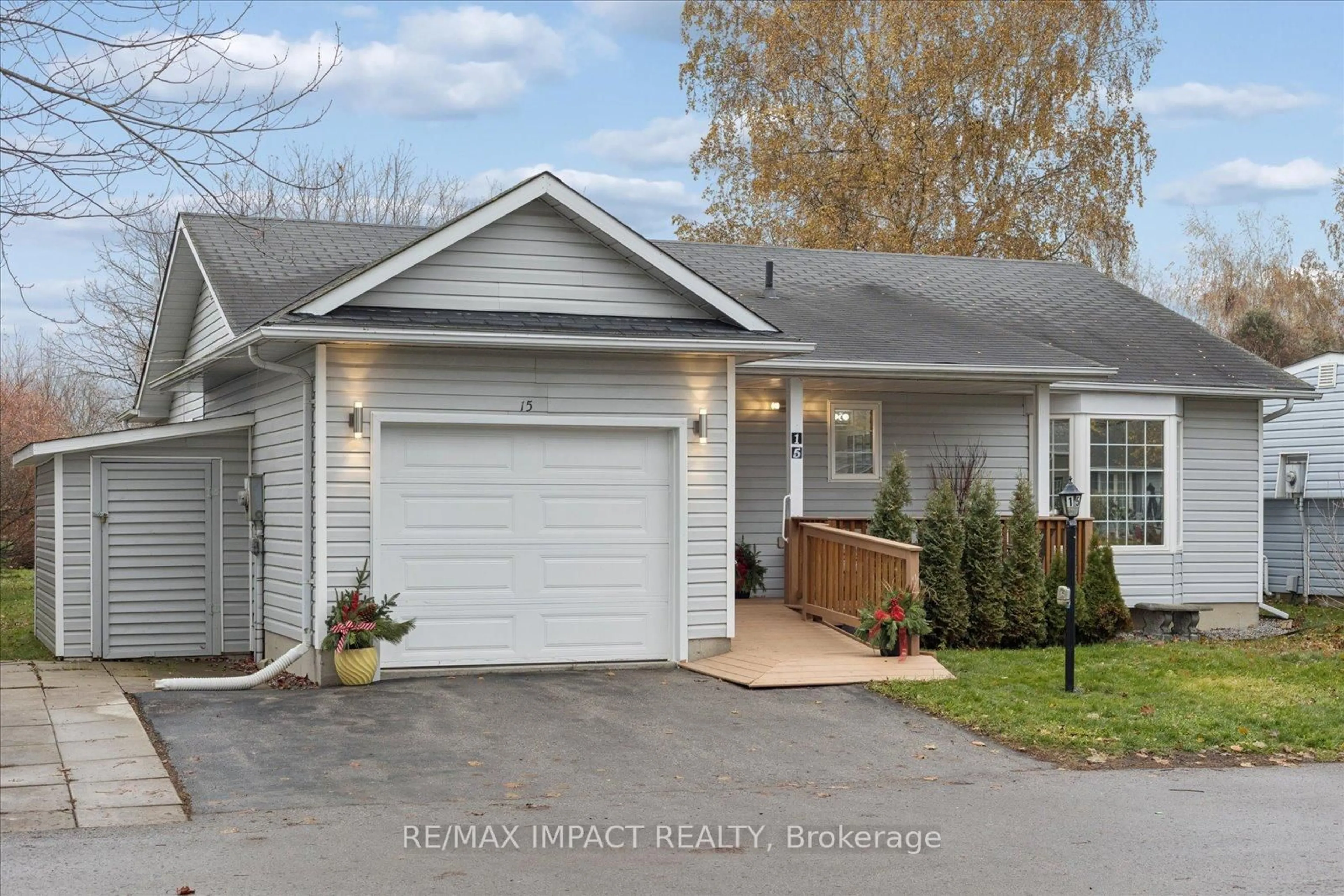 Home with vinyl exterior material, street for 15 Fairway Dr, Clarington Ontario L1B 1B3